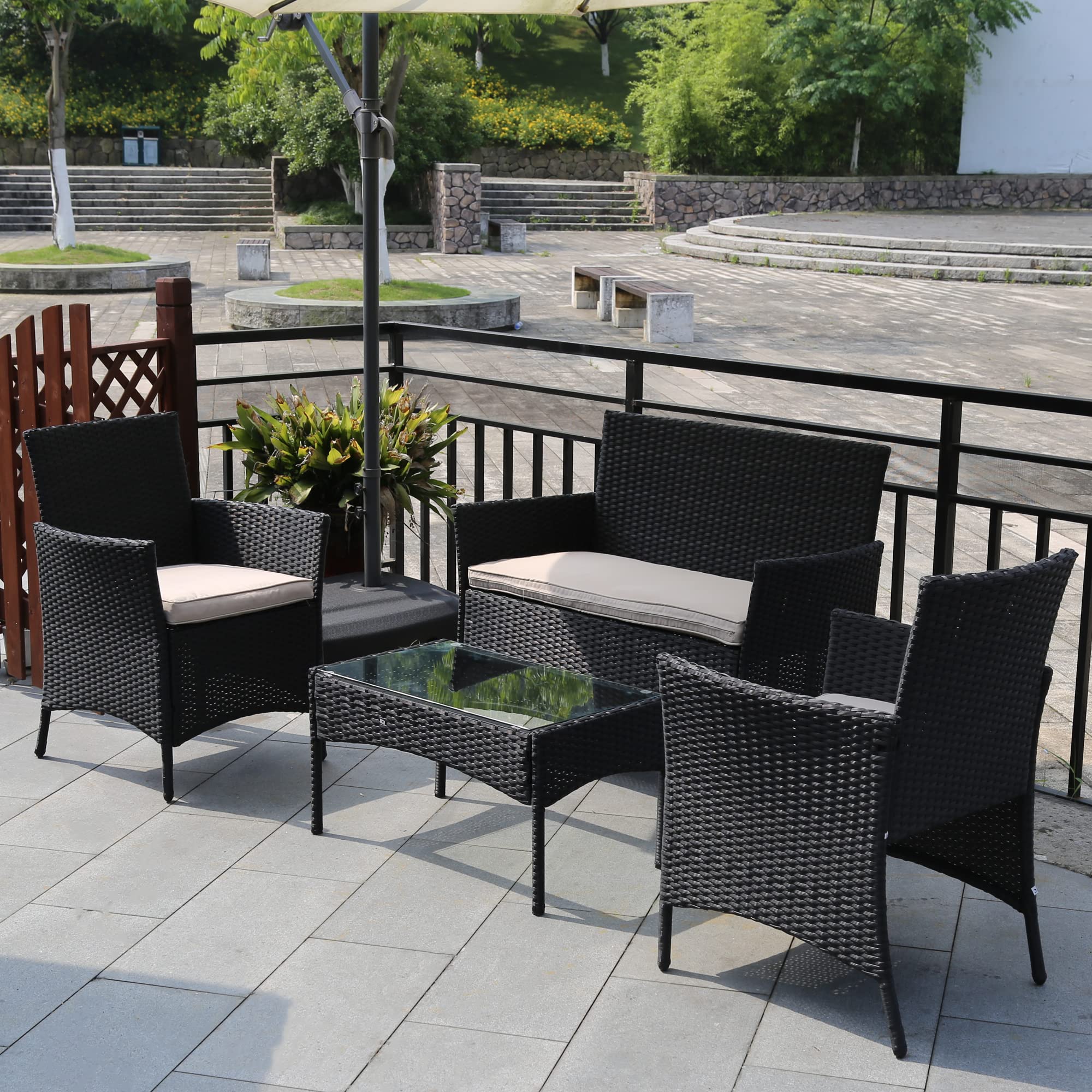 **4-Piece Black Rattan Patio Furniture Set with Soft Cushions & Glass Table - Outdoor Wicker Sofa Conversation Set for Garden, Yard, Poolside, or Backyard Relaxation**