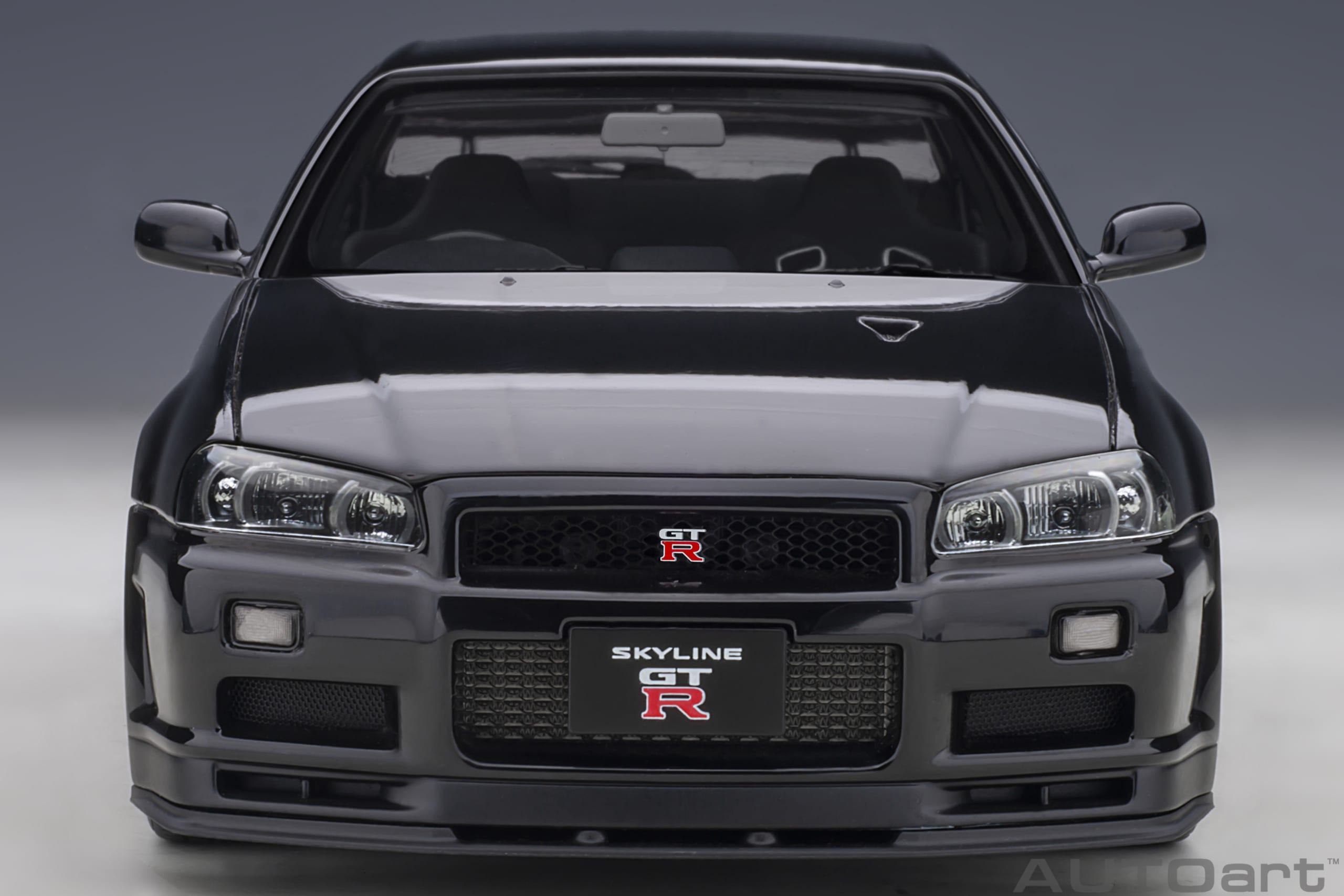 AUTOart 1:18 Scale Nissan Skyline GT-R R34 V-Spec II Diecast Model Car - Black Pearl Finish | Collector's Edition for Display & Racing Enthusiasts