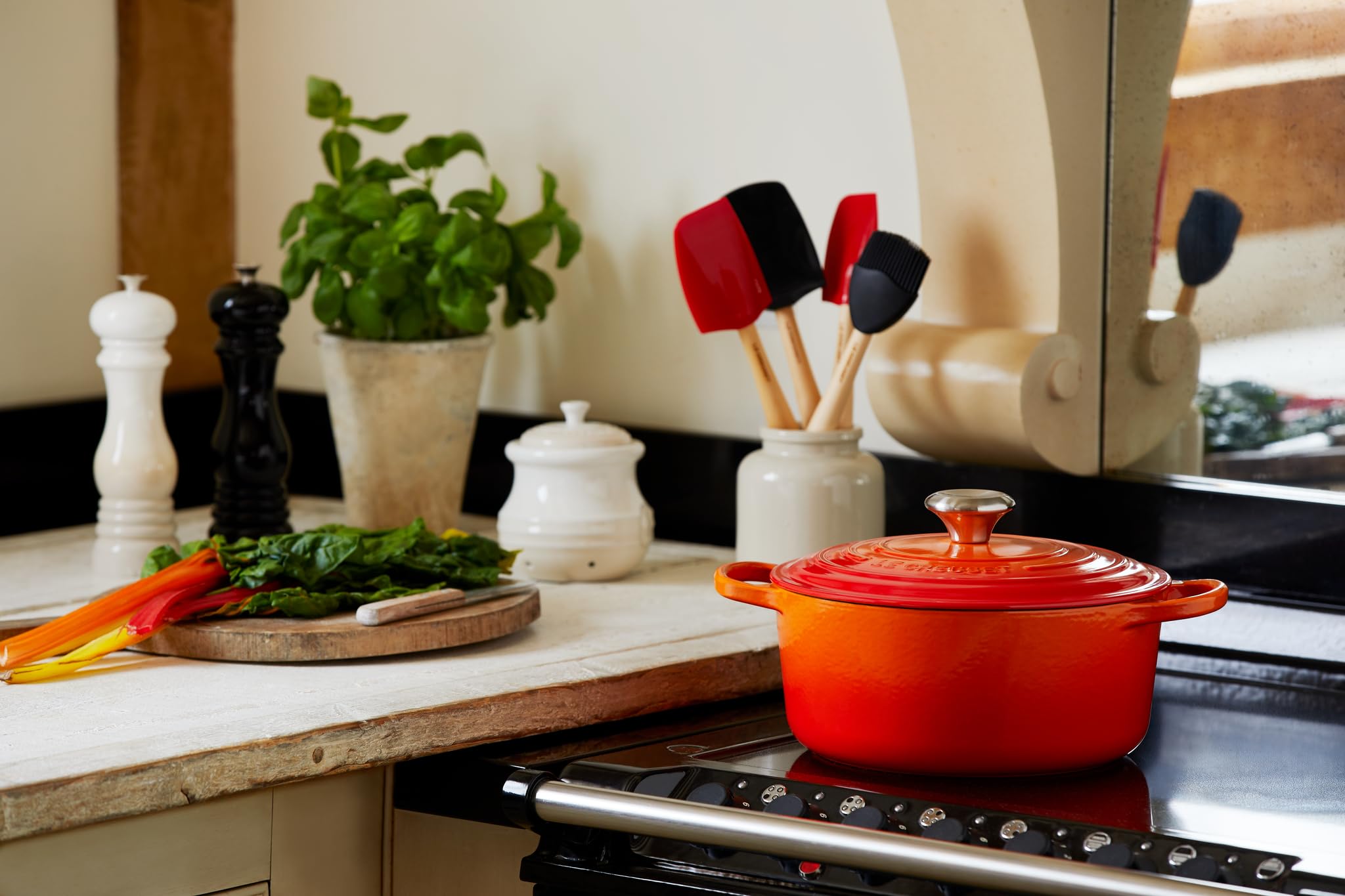 Le Creuset Signature Enameled Cast Iron Dutch Oven 4.5 Quart Round Pot - Flame Color for Braising, Roasting & Baking - Perfect for Soups, Stews & Family Dinners