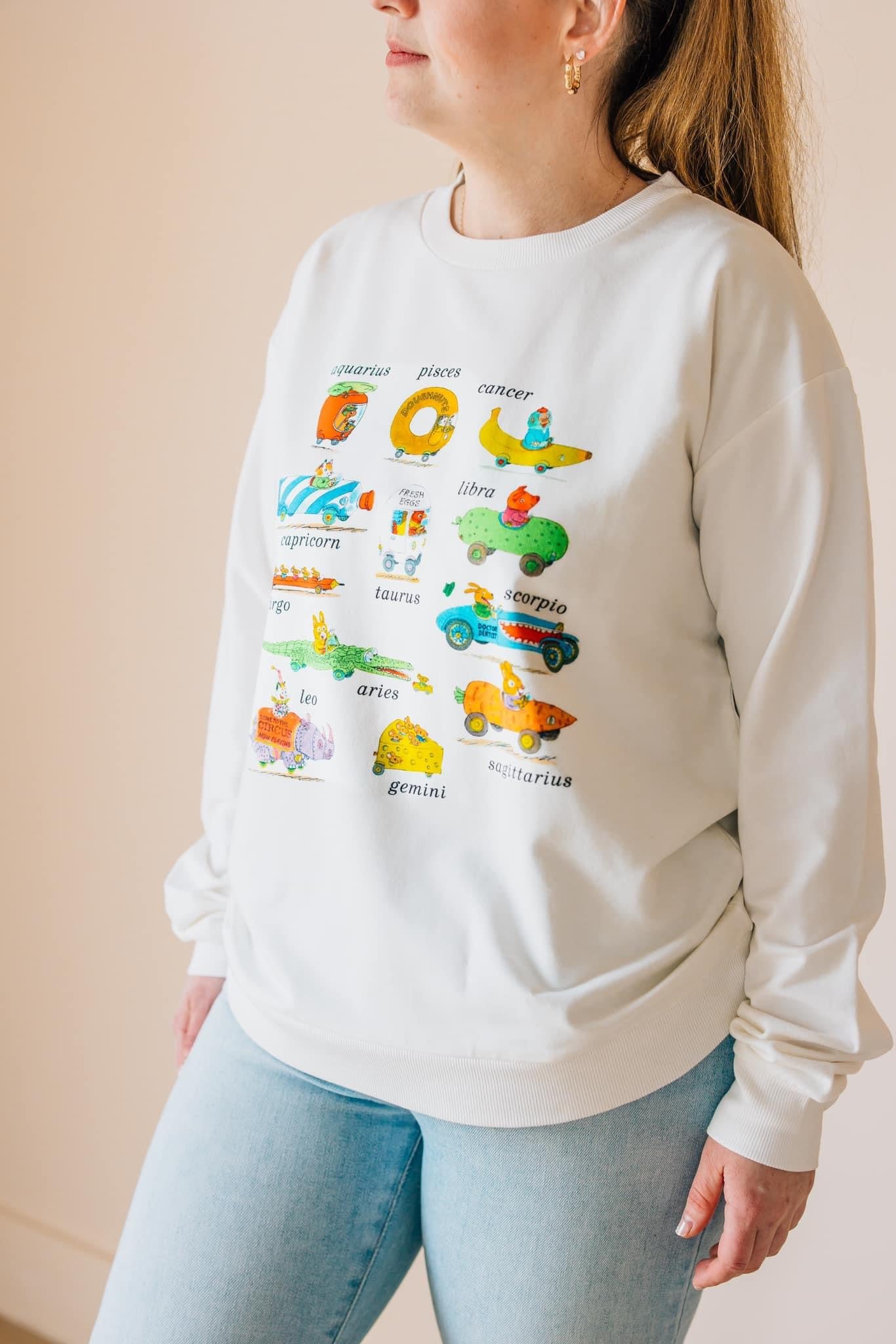 Richard Scarry's Busyworld™ Zodiac Themed Adult Sweatshirt | Comfortable Pullover Hoodie for Men & Women | Perfect for Casual Wear, Gifts & Zodiac Enthusiasts