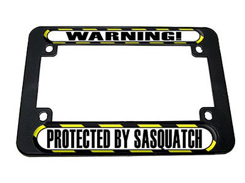 High-Quality Motorcycle License Plate Frame - 'Protected By Sasquatch' Graphic Design - Durable & Weatherproof for Harley, Cruiser, and Sports Bikes - Perfect for Road Trips, Biker Gangs, and Motorcycle Enthusiasts