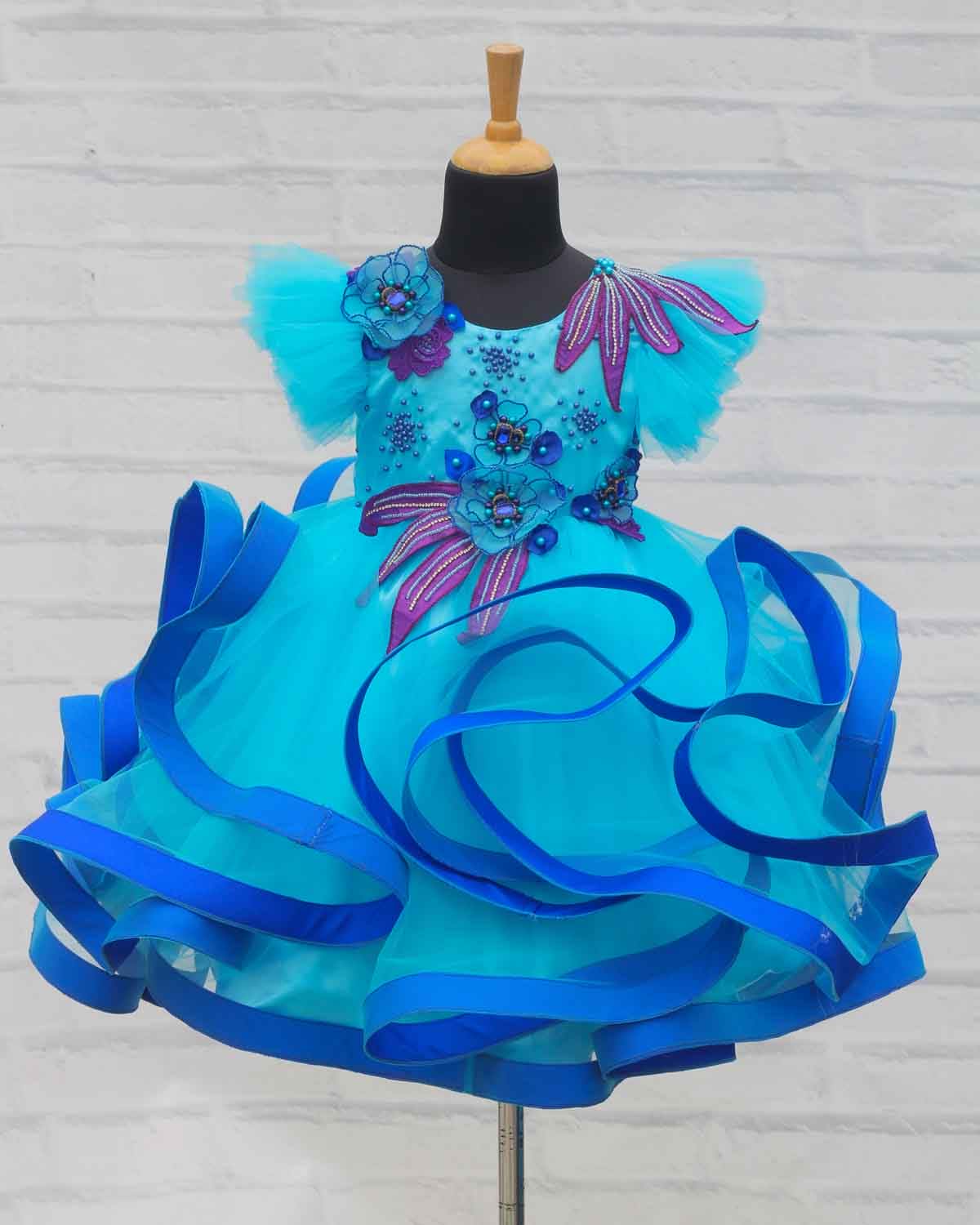 Pre Order: Handcrafted Aqua Blue & Royal Blue Twirled Gown with Purple Floral Embroidery - Perfect for Weddings, Prom & Special Occasions