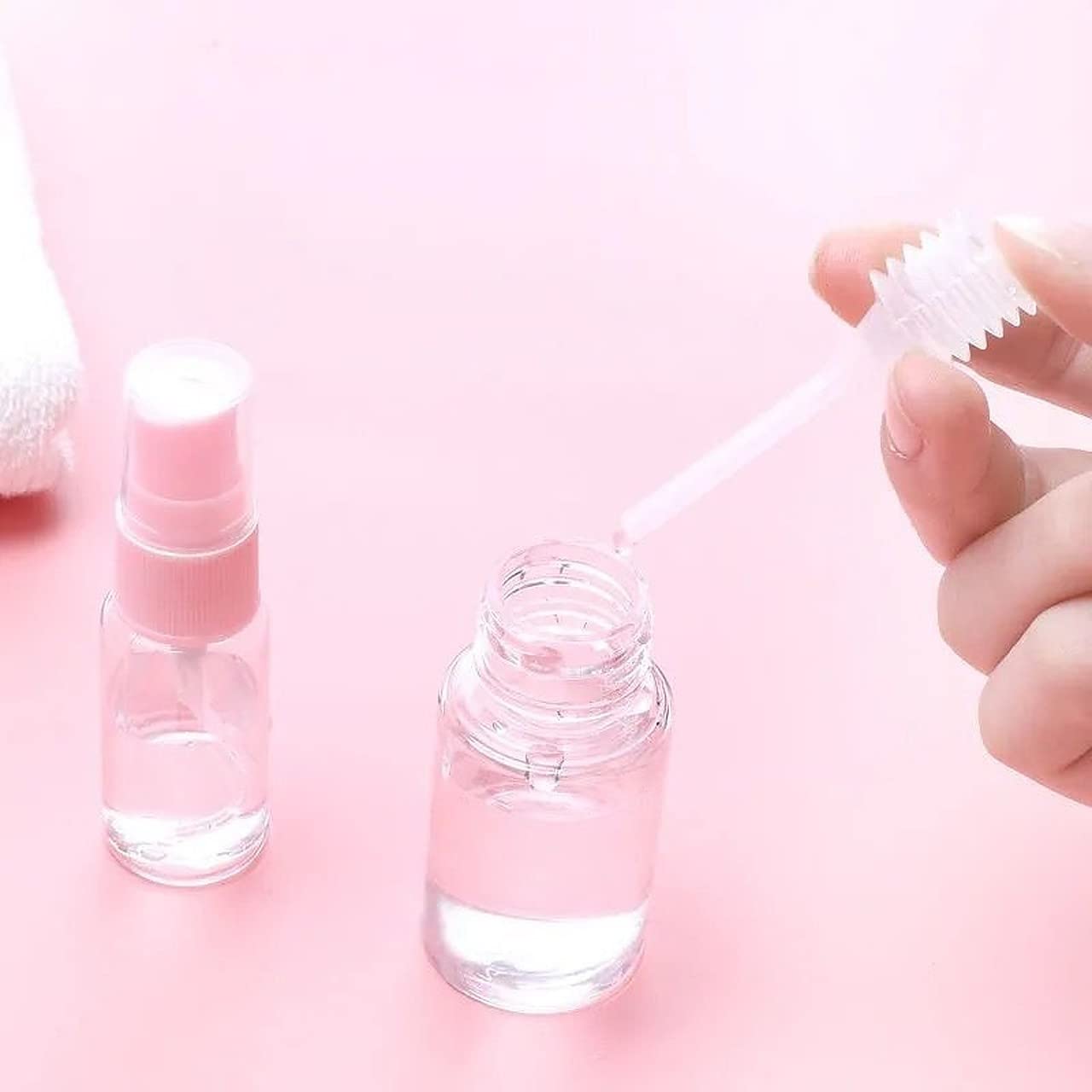 **Wolpin 10-Pack 30ml Clear Plastic Spray Bottles - Refillable Fine Mist Perfume, Shampoo & Cosmetic Bottles with Travel Pouch - Ideal for Travel, Home & Salon Use**