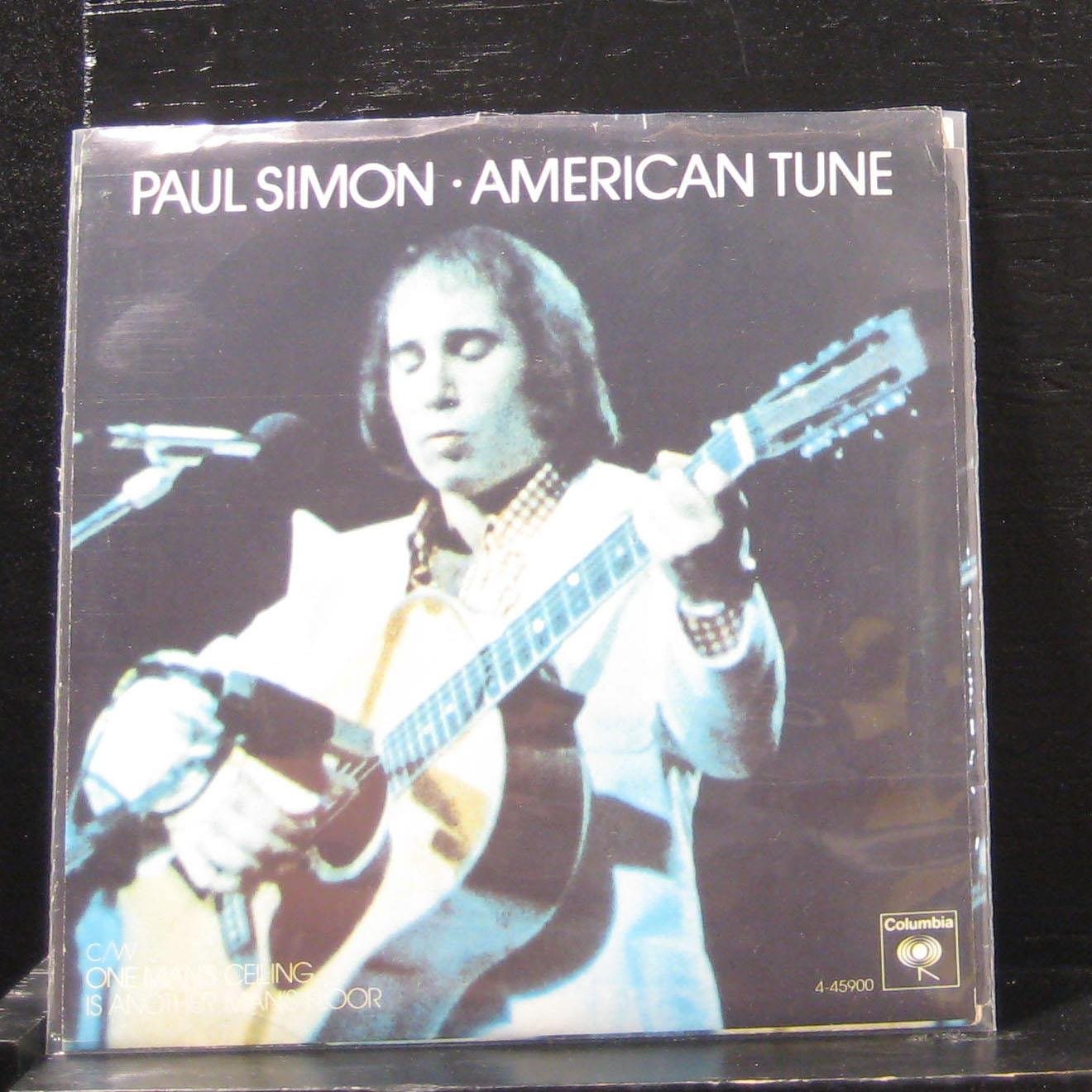 45 RPM Vinyl Record - Paul Simon 'American Tune' / 'One Man's Ceiling Is Another Man's Floor' - 7 Inch Single - Perfect for Vintage Music Collectors & Record Player Enthusiasts
