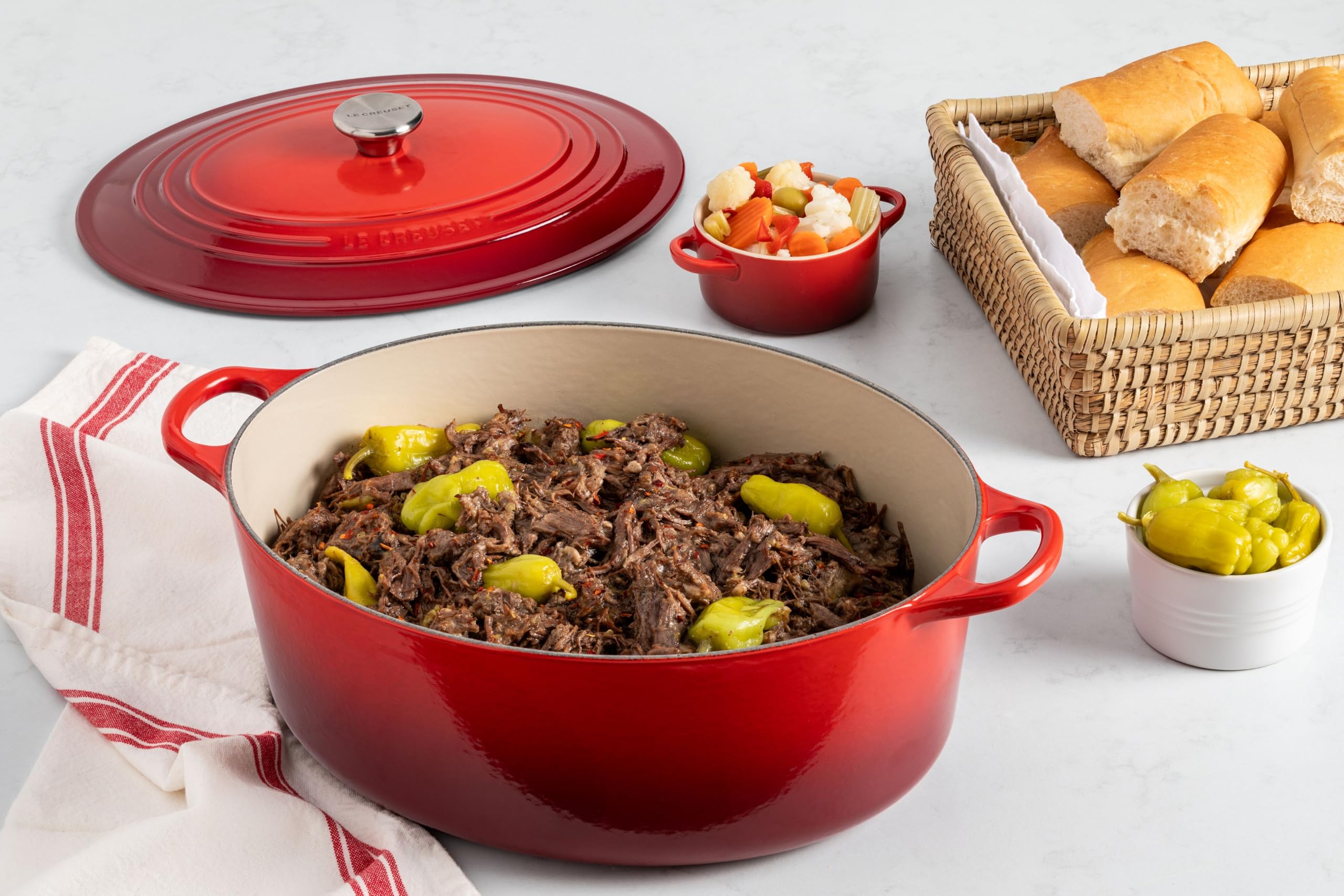 Le Creuset 8 Quart Enameled Cast Iron Oval Dutch Oven - Signature Cerise Red for Braising, Roasting & Slow Cooking | Premium Kitchen Cookware for Soups, Stews & Bread Baking