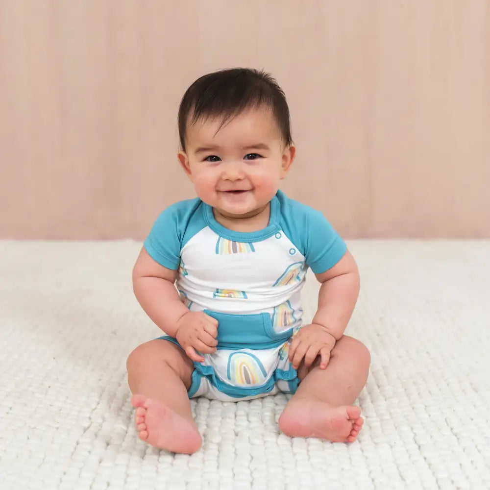 Kyte Baby Shortall in Makai Rainbow - Adorable Baby Romper for Boys & Girls | Soft Cotton Jumpsuit for Playtime, Outings & Photo Shoots