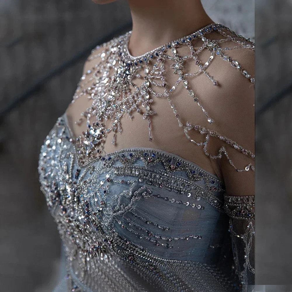 Elegant Blue A-Line Arabic Cape Sleeve Evening Gown with Beaded Bow Detail - Luxury Formal Dress for Women 2025 | Perfect for Weddings, Galas & Special Occasions