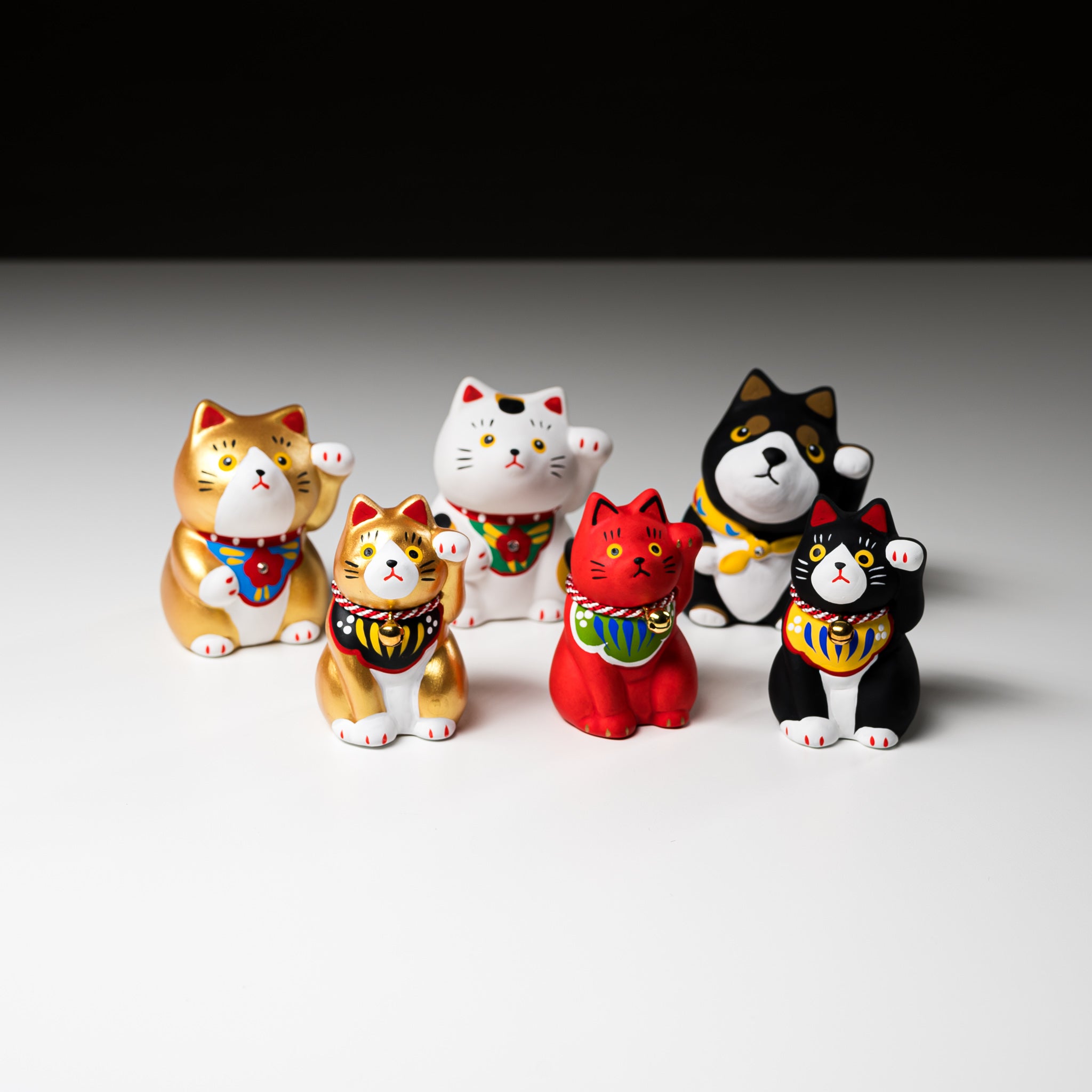 White Beckoning Cat Handheld Lucky Ornament - Cute Mochi Style Maneki Neko for Home Decor, Office Desk & Gift Giving