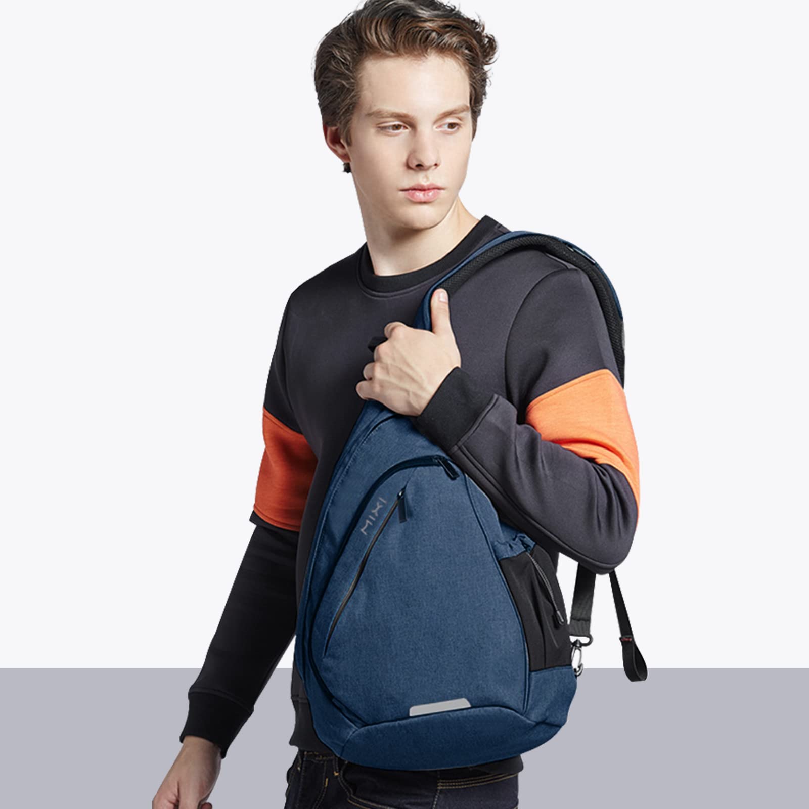 Hanke Sling Bag for Men & Women - Lightweight Unisex Shoulder Backpack with USB Charging Port - Perfect for Hiking, Travel, Gym & Everyday Use