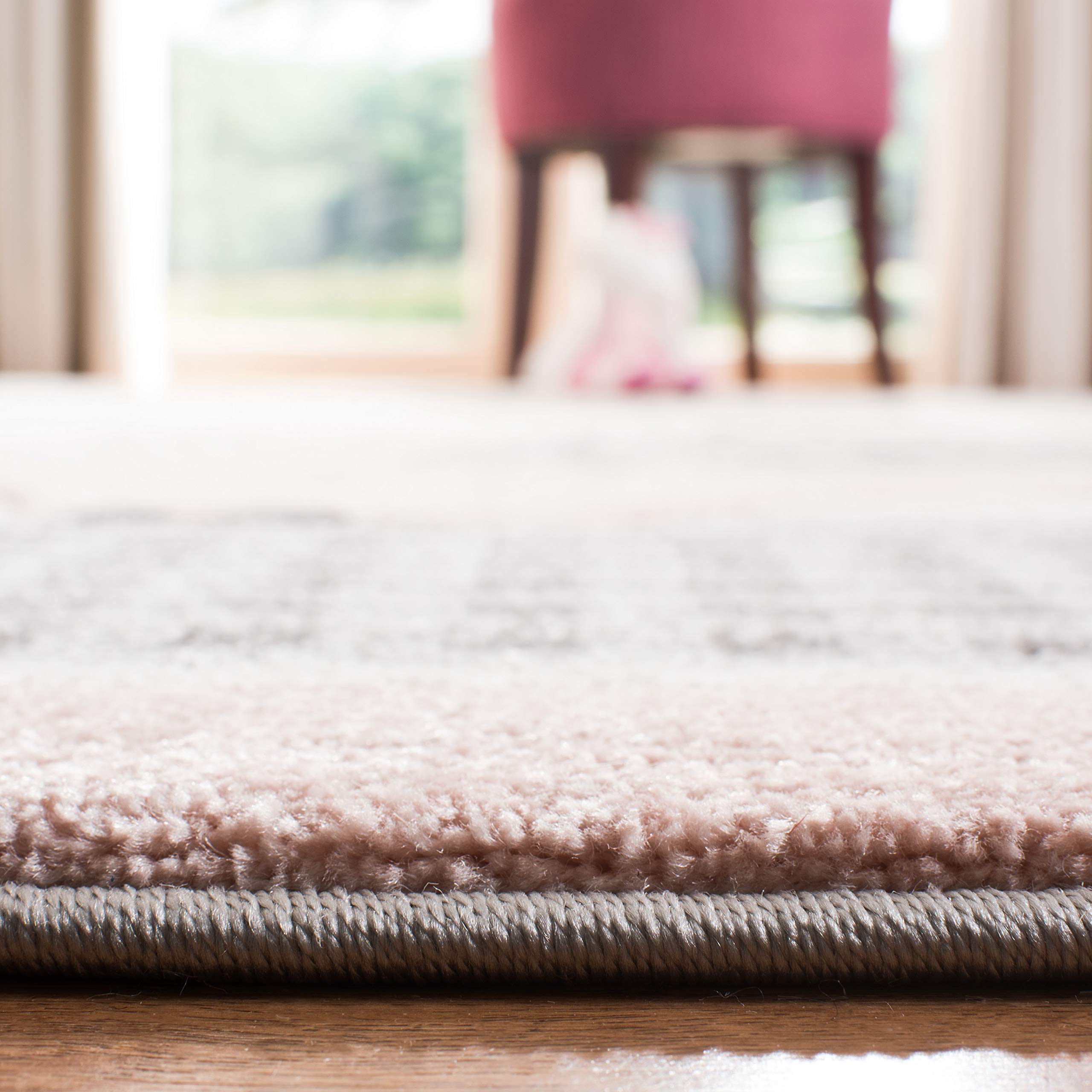 SAFAVIEH Carousel Kids Collection 8' x 10' Pink & Ivory Animal Print Area Rug - Non-Shedding, Easy Care, Durable for High Traffic - Perfect for Playroom, Nursery, Bedroom, Kids Room Decor - CRK127P