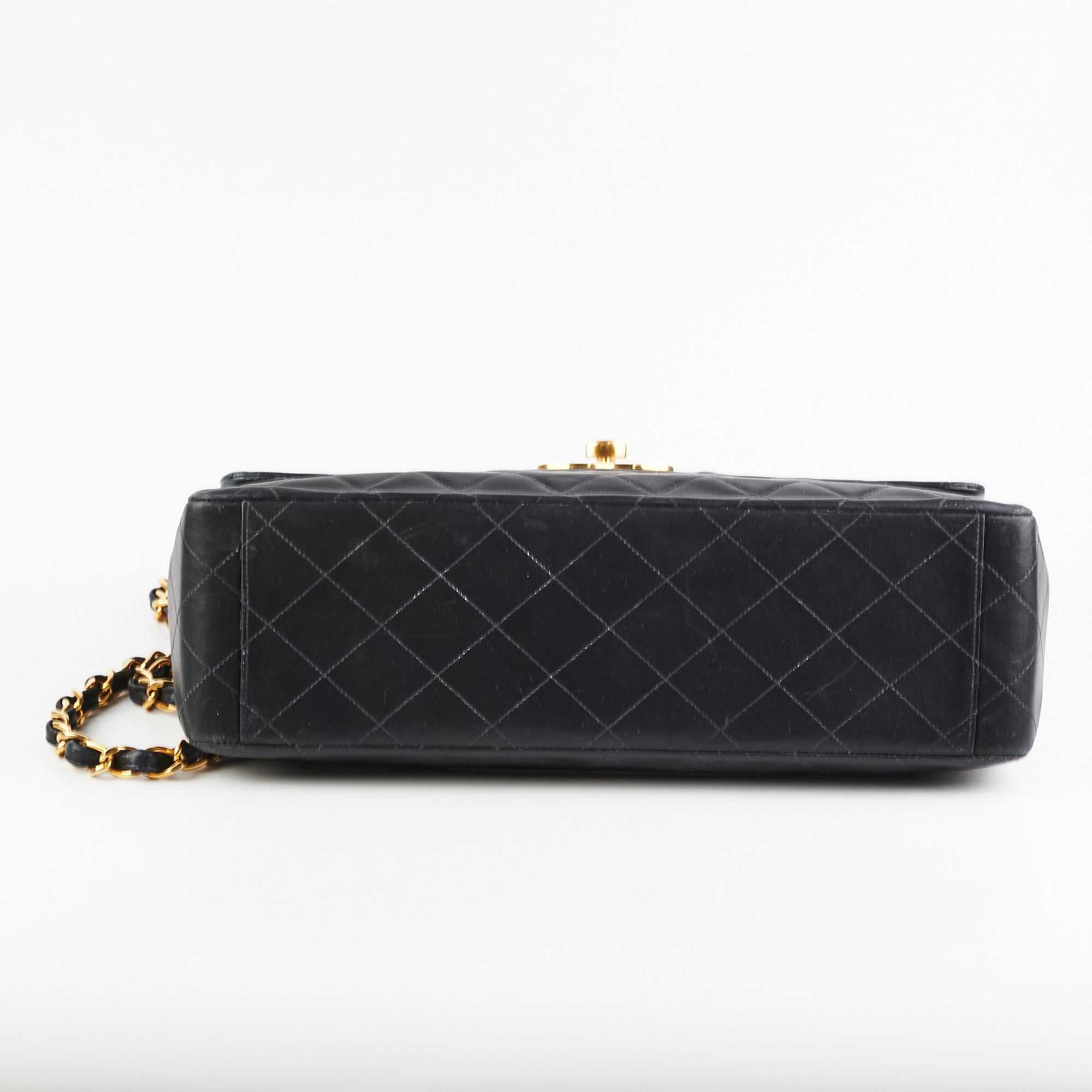 Vintage Chanel Maxi Jumbo Black Leather Flap Bag - Classic Luxury Handbag for Women, Perfect for Evening Parties, Date Nights & Special Occasions
