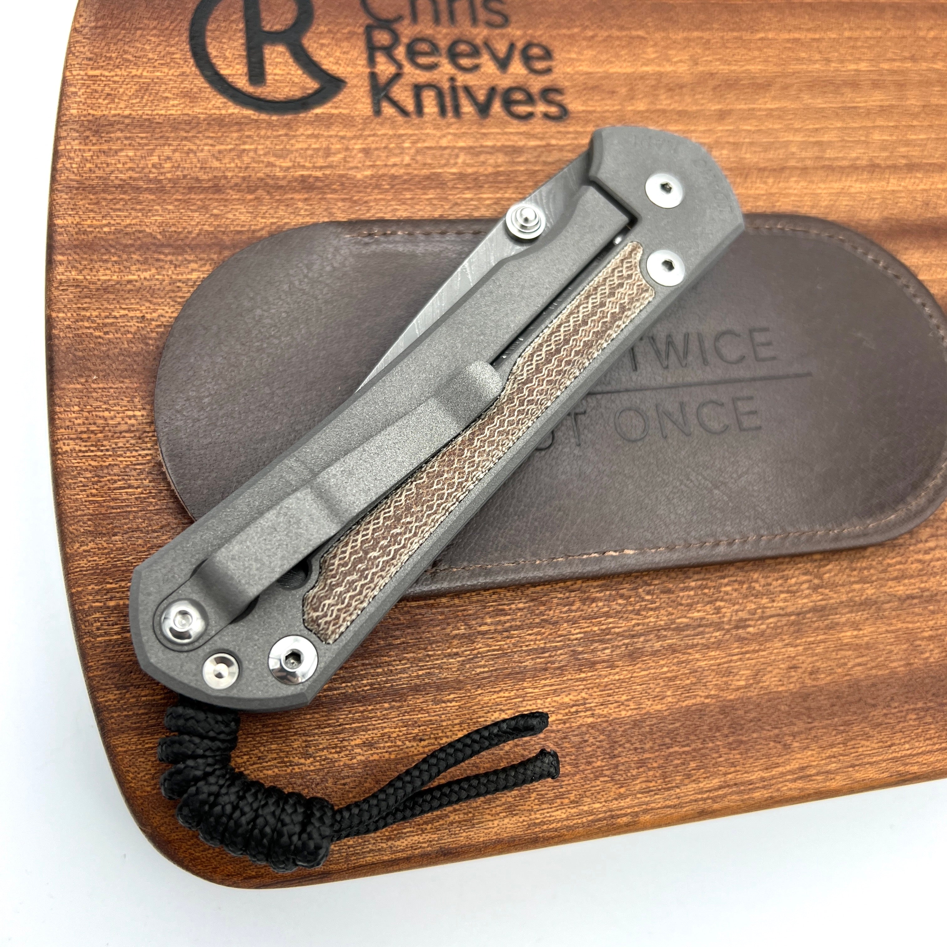 Chris Reeve Knives Large Sebenza 31 Drop Point Folding Knife - Boomerang Damascus Blade, Left-Hand Natural Canvas Micarta Inlay & Double Silver Lug - Perfect for Outdoor Camping, Hunting, and EDC Collection