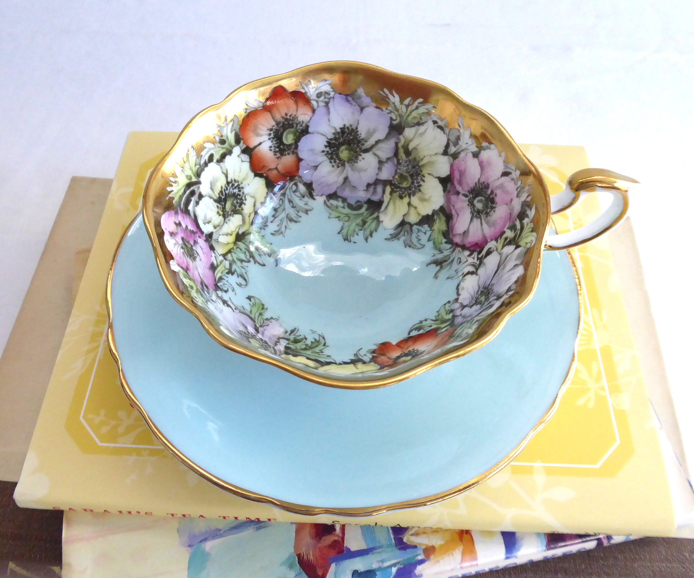 Vintage Paragon Cup and Saucer Set - Luxe Gold Trim with Aqua Poppies Design, Queen Elizabeth Warrant 1950s - Perfect for Afternoon Tea, Collectible China Display, and British Royalty Memorabilia