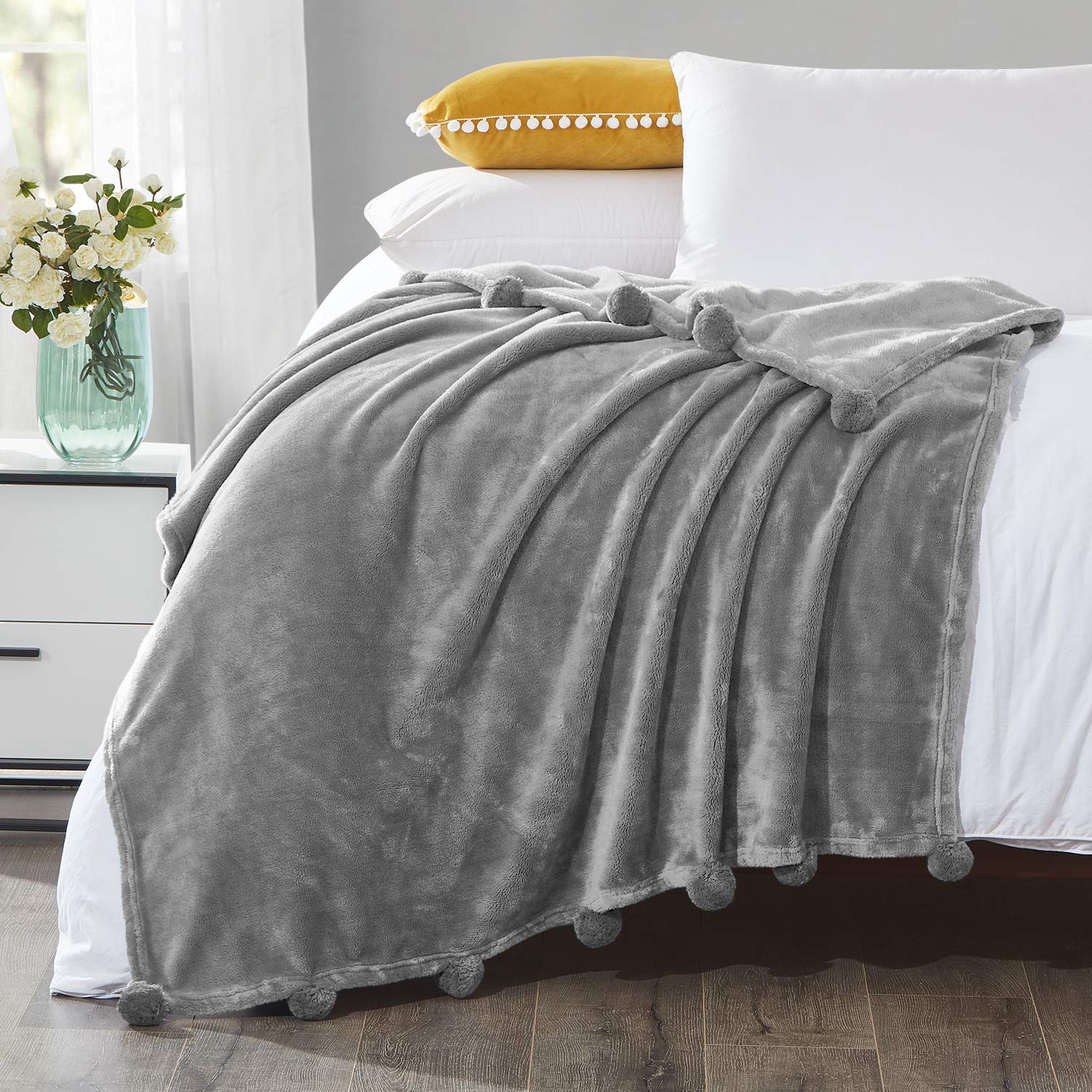 HOMEIDEAS Flannel Fleece Blanket Throw 50x60 Inches - Ultra Soft Lightweight Fuzzy Blanket for Couch, Bed, Camping & Travel - All Season Cozy Blanket with Pompom Fringe (Light Grey) - Perfect for Netflix Nights, Picnics and Gift Giving