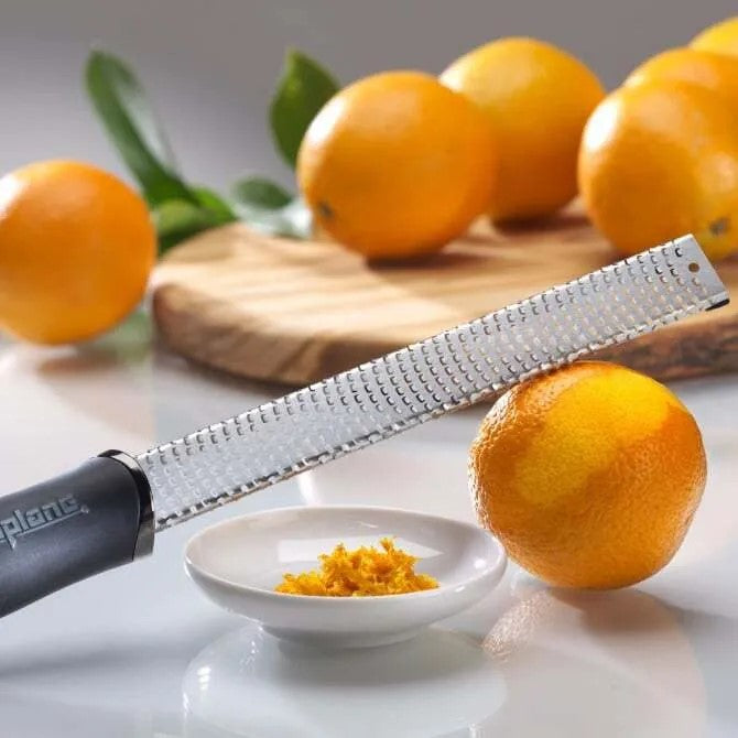 Microplane Premium Series Zester Grater - Ultra Sharp Stainless Steel Kitchen Tool for Zesting Citrus, Grating Cheese & Chocolate - Perfect for Baking, Cooking & Garnishing Dishes