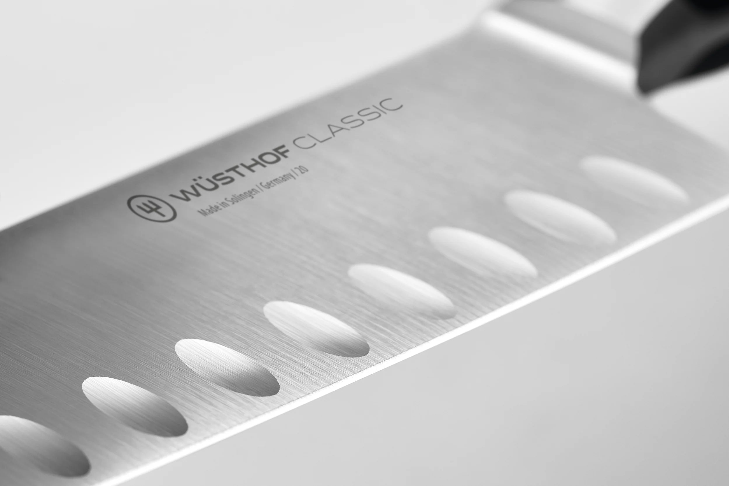 Wusthof Classic Hollow Ground Santoku Knife - Premium German Kitchen Knife for Precision Slicing, Dicing & Chopping - Perfect for Vegetables, Meat & Sushi Preparation