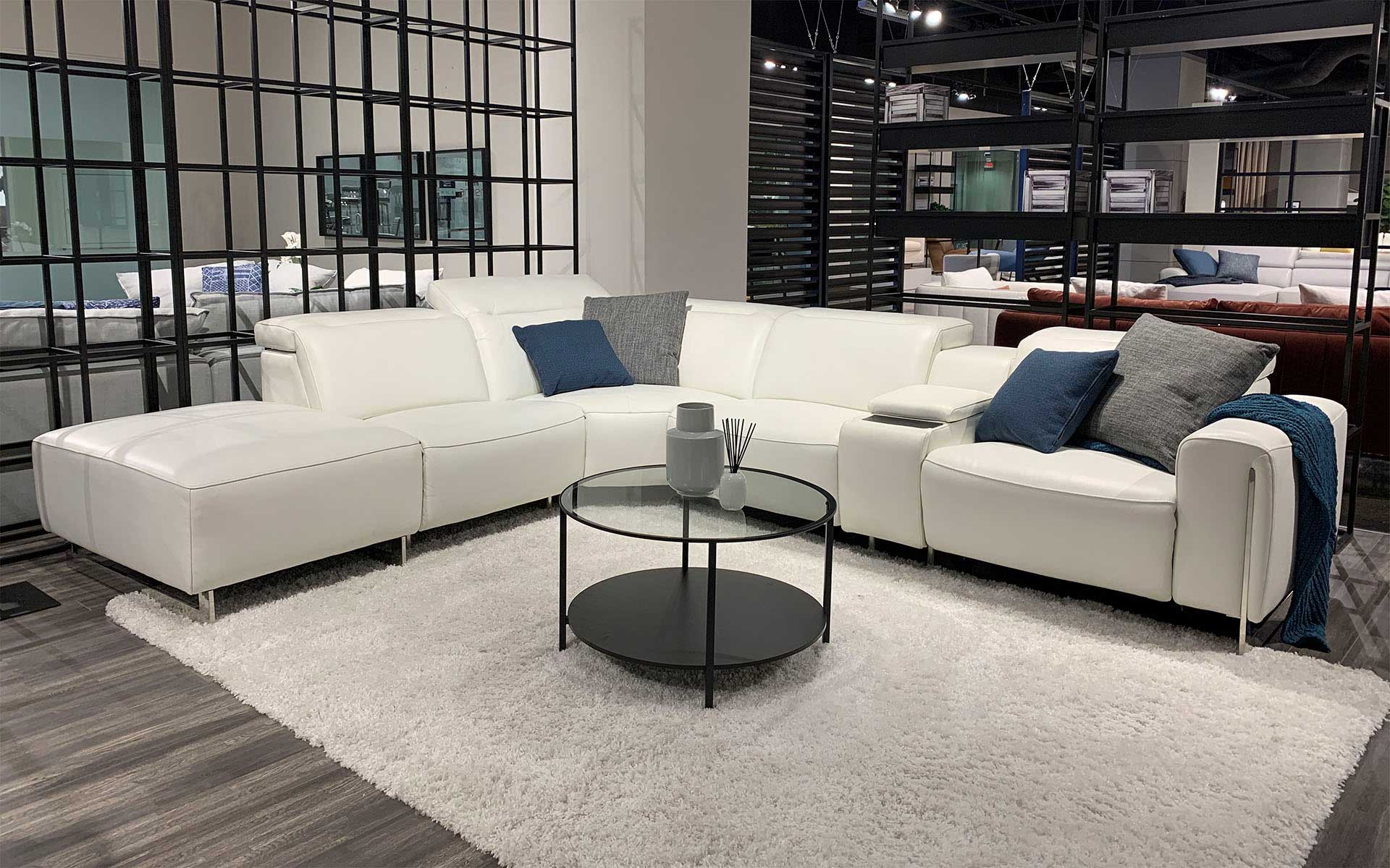 VOYAGE Modern Leather Sectional Sofa with Ottoman - Stylish & Comfortable Living Room Furniture for Home Theater & Family Gatherings