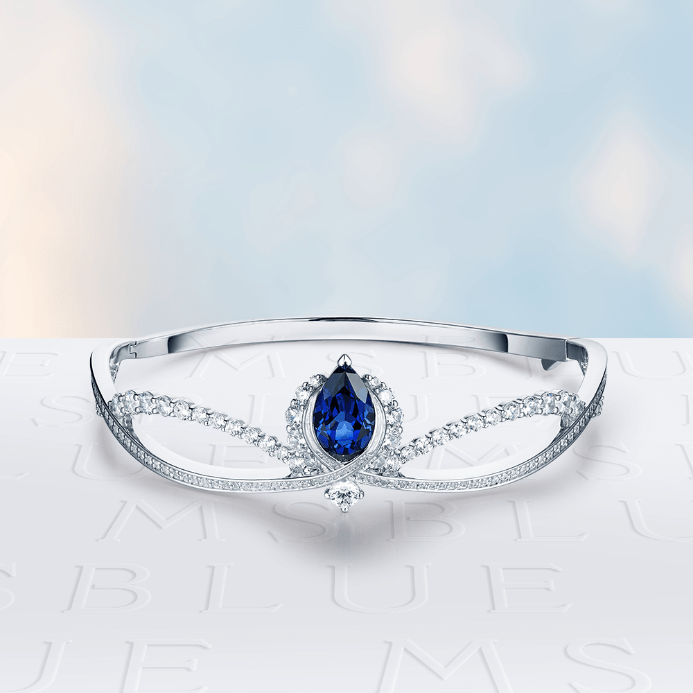 Luxury Pear-Shaped Sapphire Bangle Bracelet in Endless Blue - Elegant Jewelry for Weddings, Parties & Special Occasions