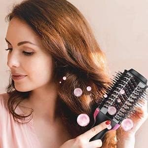 Upgraded 4-in-1 Blowout Hair Dryer Brush - Hot Air Styler, Volumizer & Straightening Comb with Negative Ion Technology for All Hair Types (Oval Shape, Black, 1200W) - Perfect for Salon-Quality Styling at Home, Travel & Daily Hair Care