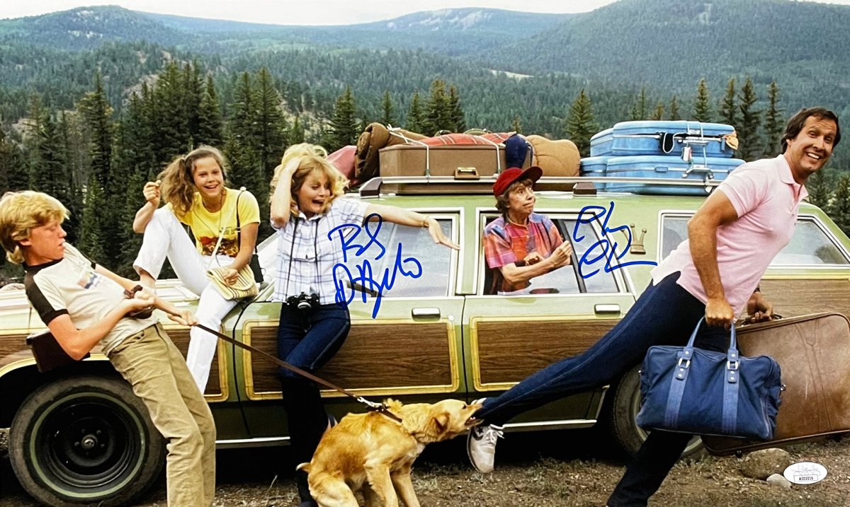 Chevy Chase & Beverly D'Angelo Autographed National Lampoon's Vacation 12x20 Photo - JSA Certified - Perfect for Movie Memorabilia Collectors & Christmas Vacation Fans Display