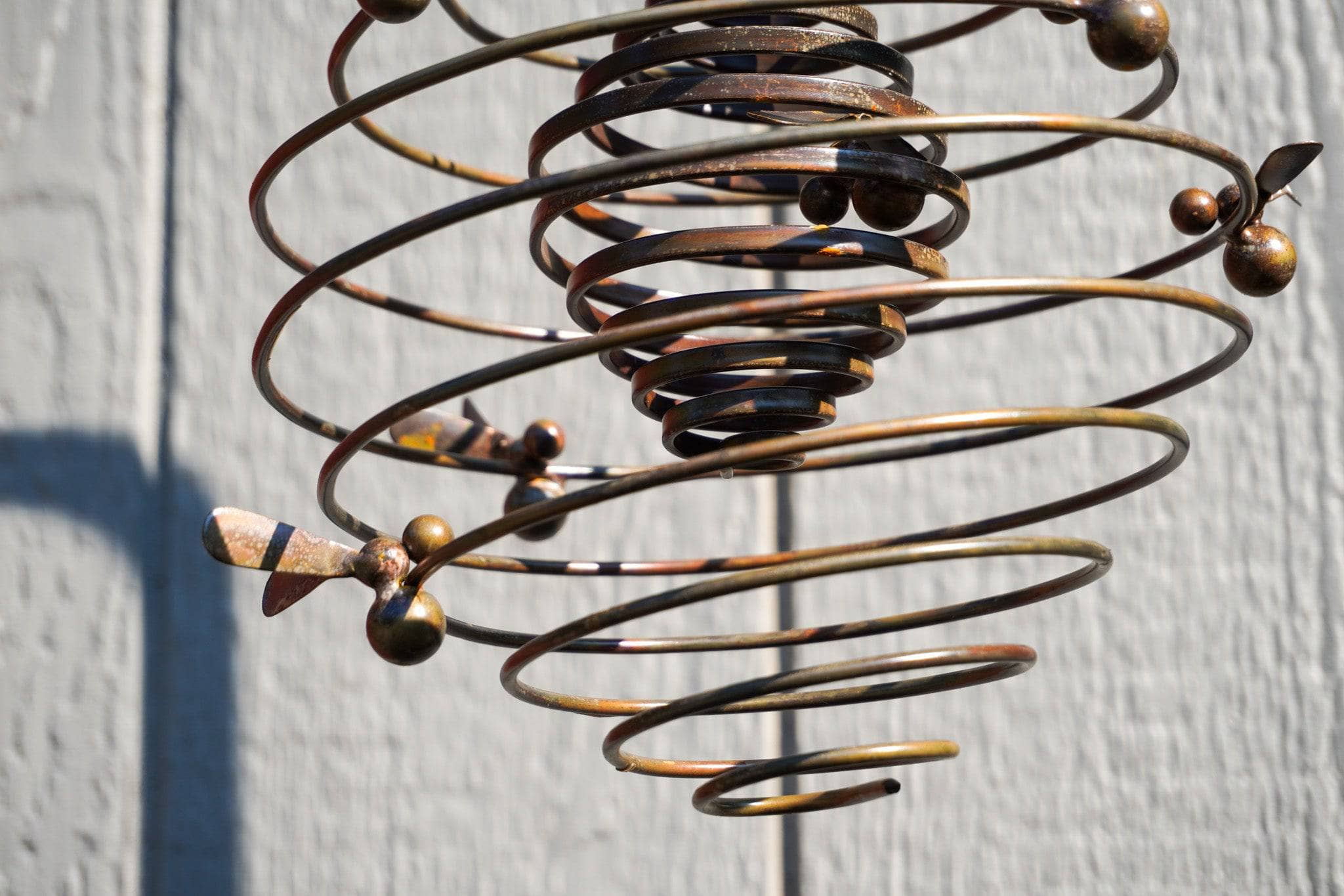 Double Spiral Bee Garden Ornament - Handcrafted Metal Decoration for Outdoor Lawn, Yard, and Patio Decor - Perfect for Garden, Backyard, and Landscape Design