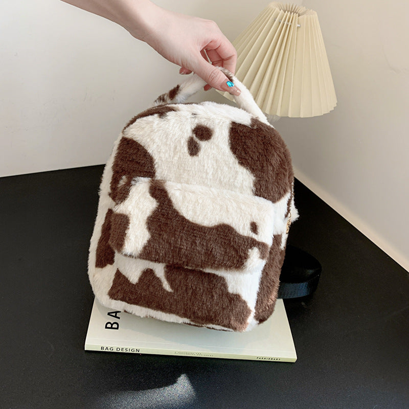 Adorable Cow Print Furry Backpack for Women - Small Cute Shoulder Bag for School, Travel & Daily Use