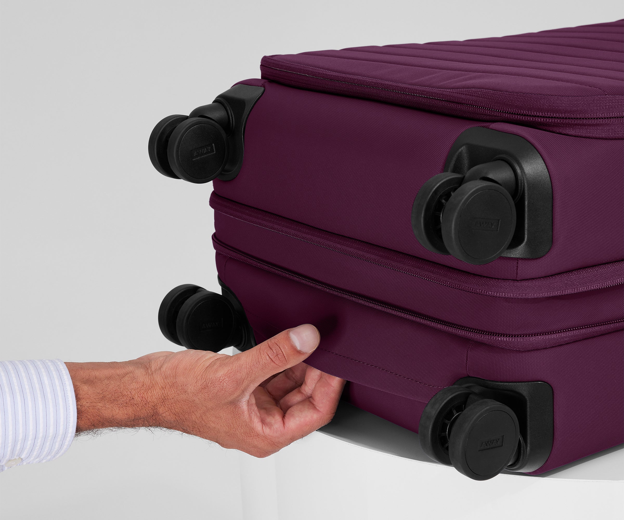 Softside Bigger Carry On Luggage in Plum Purple - Lightweight Expandable Suitcase for Air Travel & Weekend Getaways