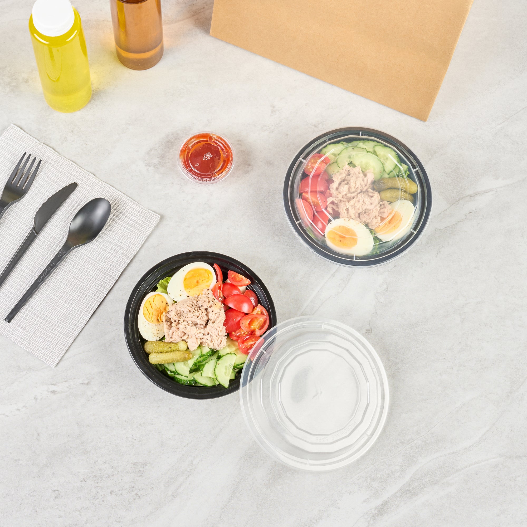 16 oz Black Plastic Takeout Containers with Clear Lids - 50 Pack, Microwave Safe (6.25