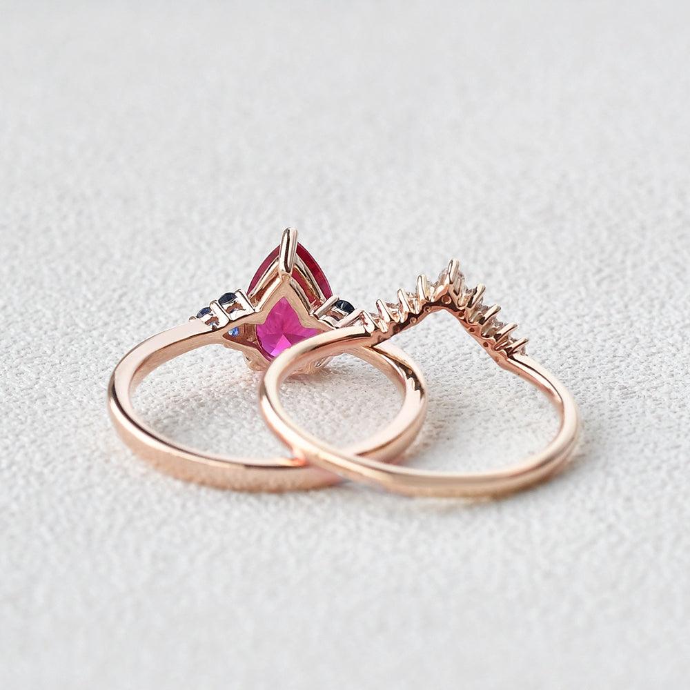 Lab-Created Ruby Rose Gold Ring Set - 2 Piece Pear Shaped Wedding Band & Engagement Ring for Women | Perfect for Proposals, Anniversaries & Special Occasions