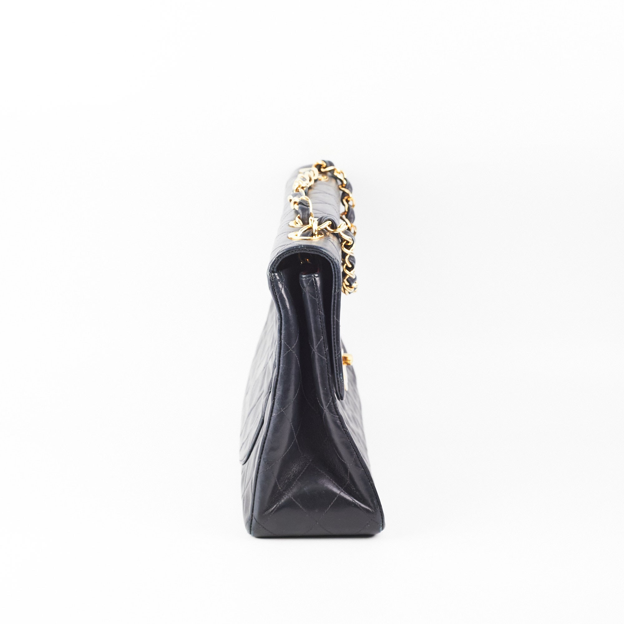 Vintage Chanel Maxi Flap Bag in Black with 24K Gold Hardware - Perfect for Luxury Fashion & Special Occasions