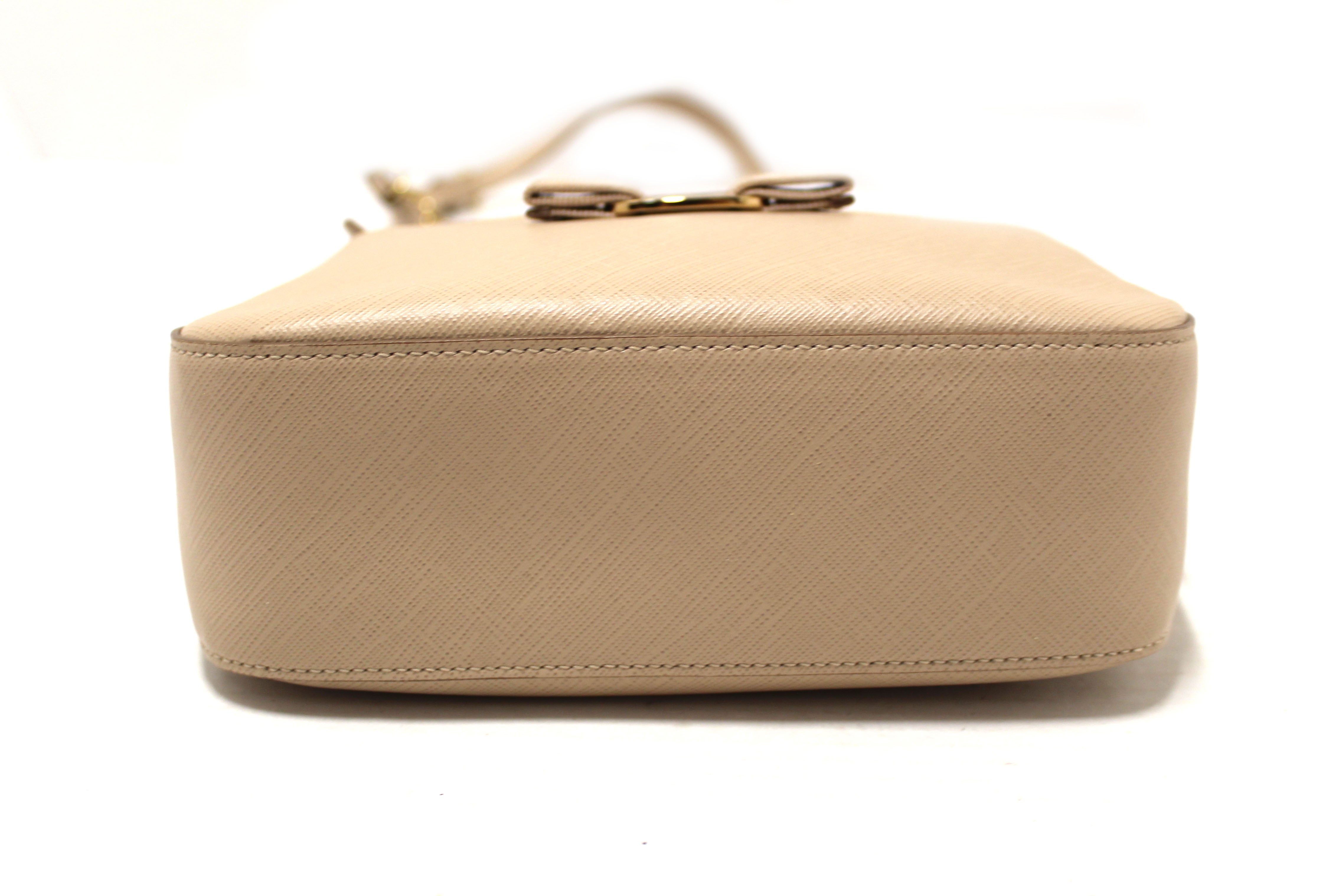 Authentic Salvatore Ferragamo Lydia Bow Camera Crossbody Bag - Beige Calfskin Leather Handbag for Women | Perfect for Work, Travel & Evening Events
