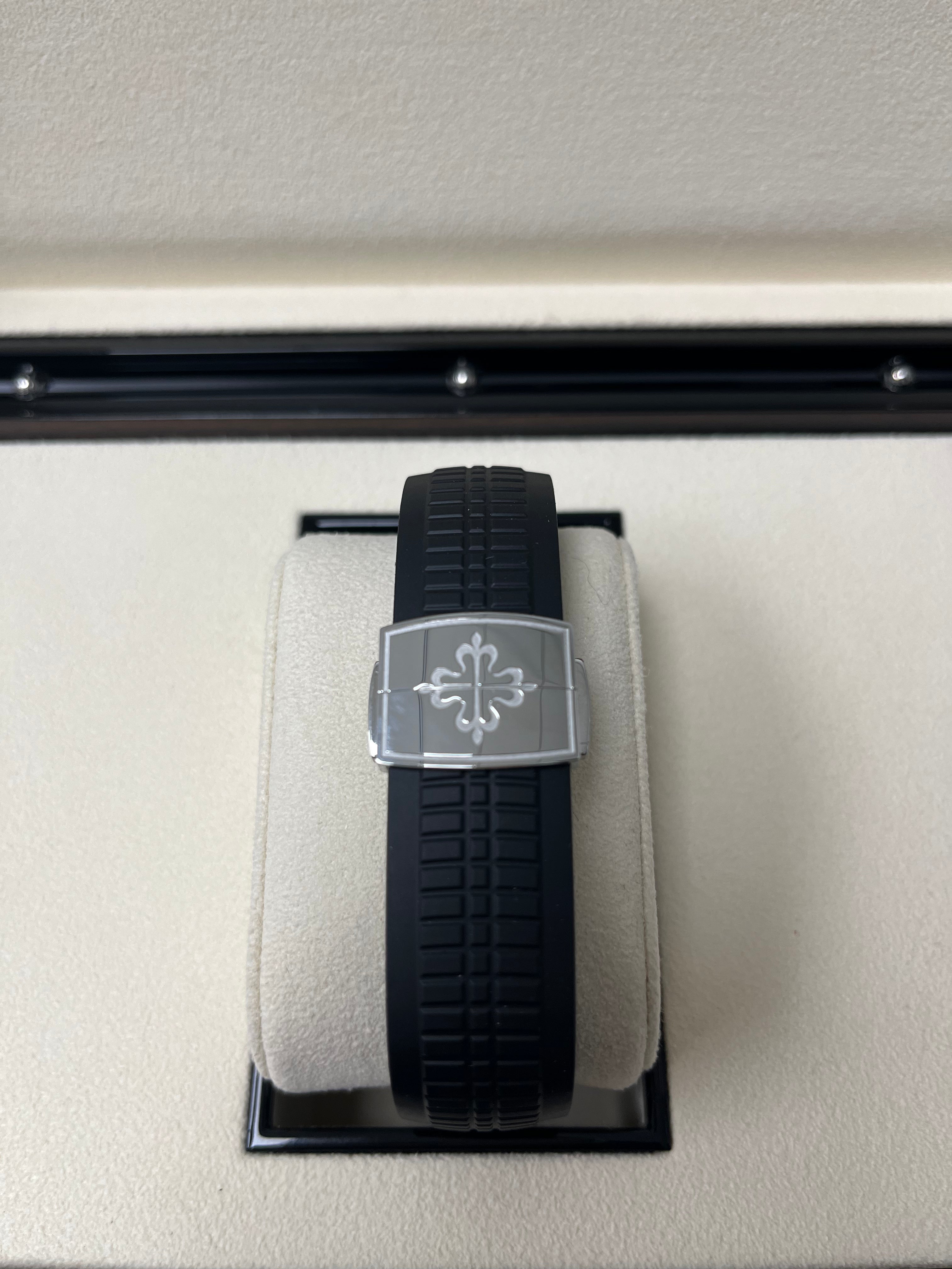 Patek Philippe Aquanaut Stainless Steel Watch with Black Embossed Dial - Ref#5167A-001 - Luxury Sports Watch for Men, Perfect for Business, Formal Events & Everyday Wear