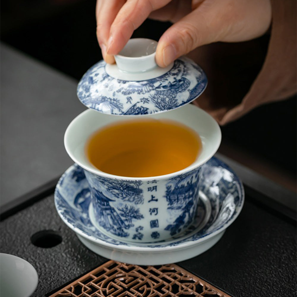 Riverside Scene at Qingming Festival Chinese Tea Set - Hand-Painted Porcelain Tea Cup & Saucer Set - Traditional Gift for Tea Lovers - Perfect for Home Tea Ceremony & Asian Culture Enthusiasts