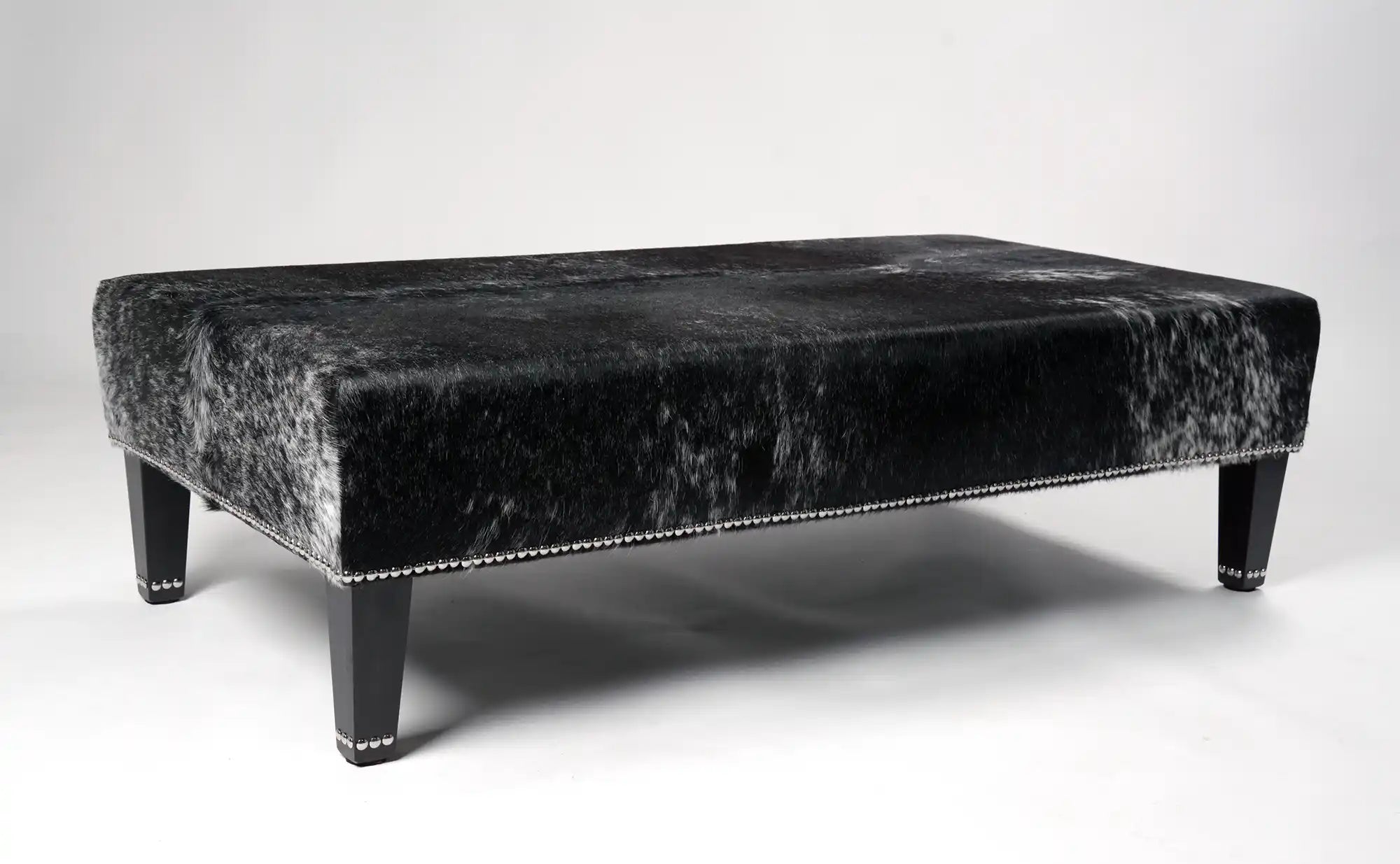Premium Cowhide Ottoman with Sturdy Wood Stud Legs - 51