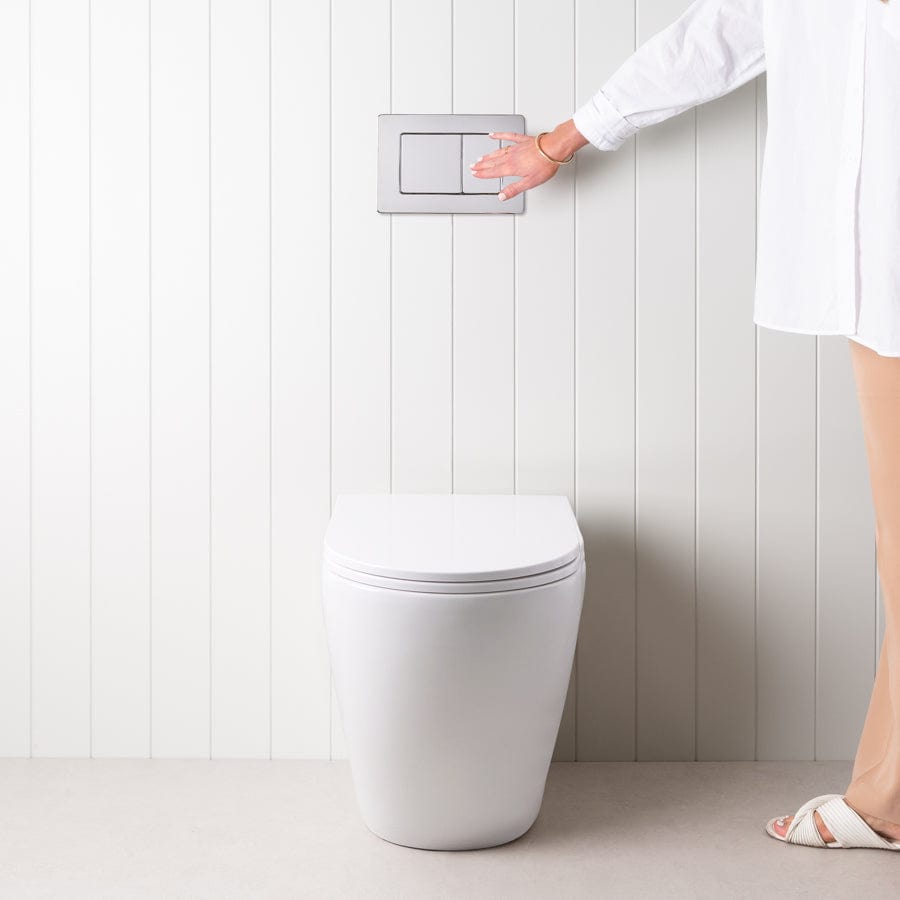 Angled In-Wall Toilet with Rectangle Chrome Buttons - Modern Space-Saving Bathroom Solution for Small Homes and Apartments