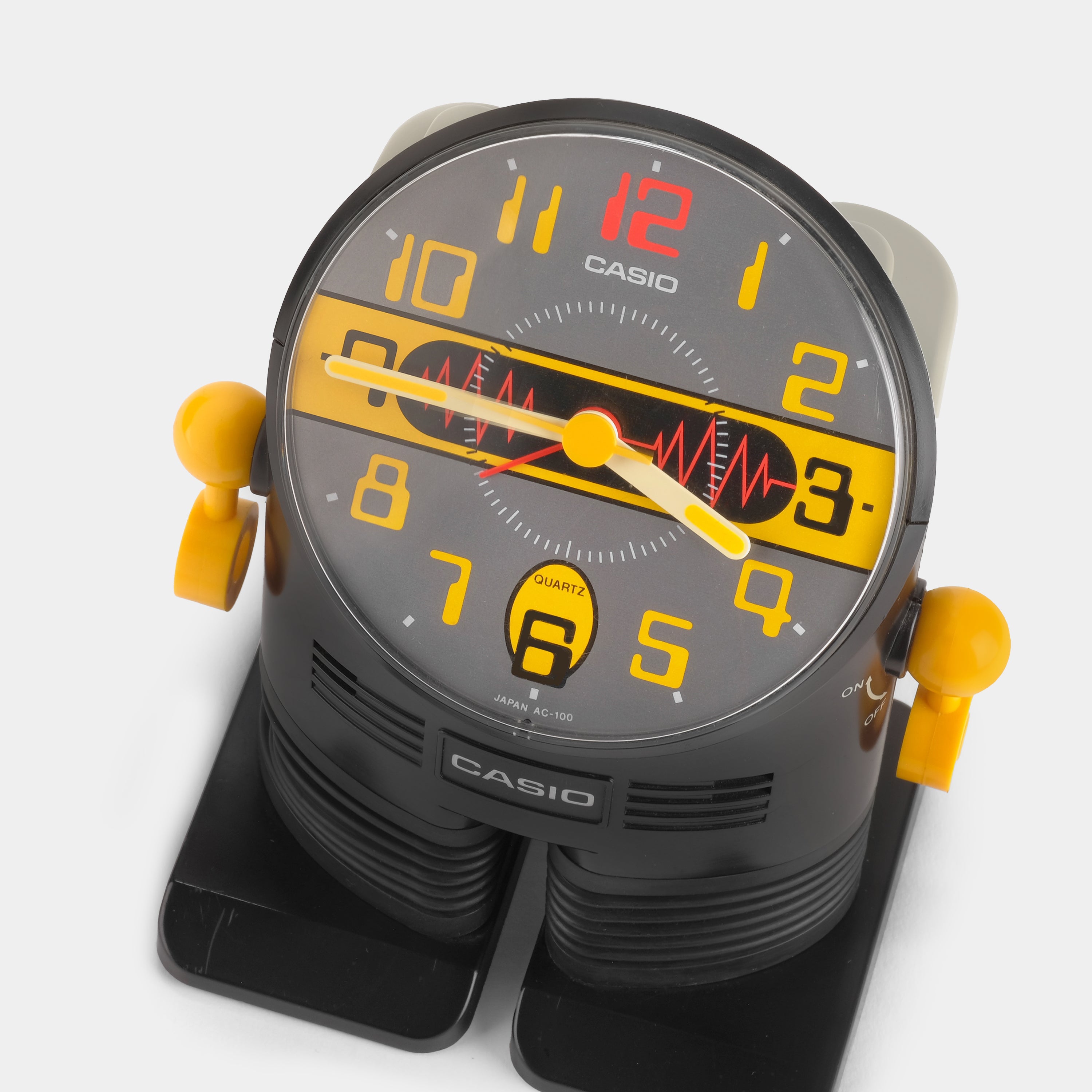 Casio AC-100 Black Digital Alarm Clock with Robot Design - Perfect for Kids' Bedrooms, Offices, and Gift Giving