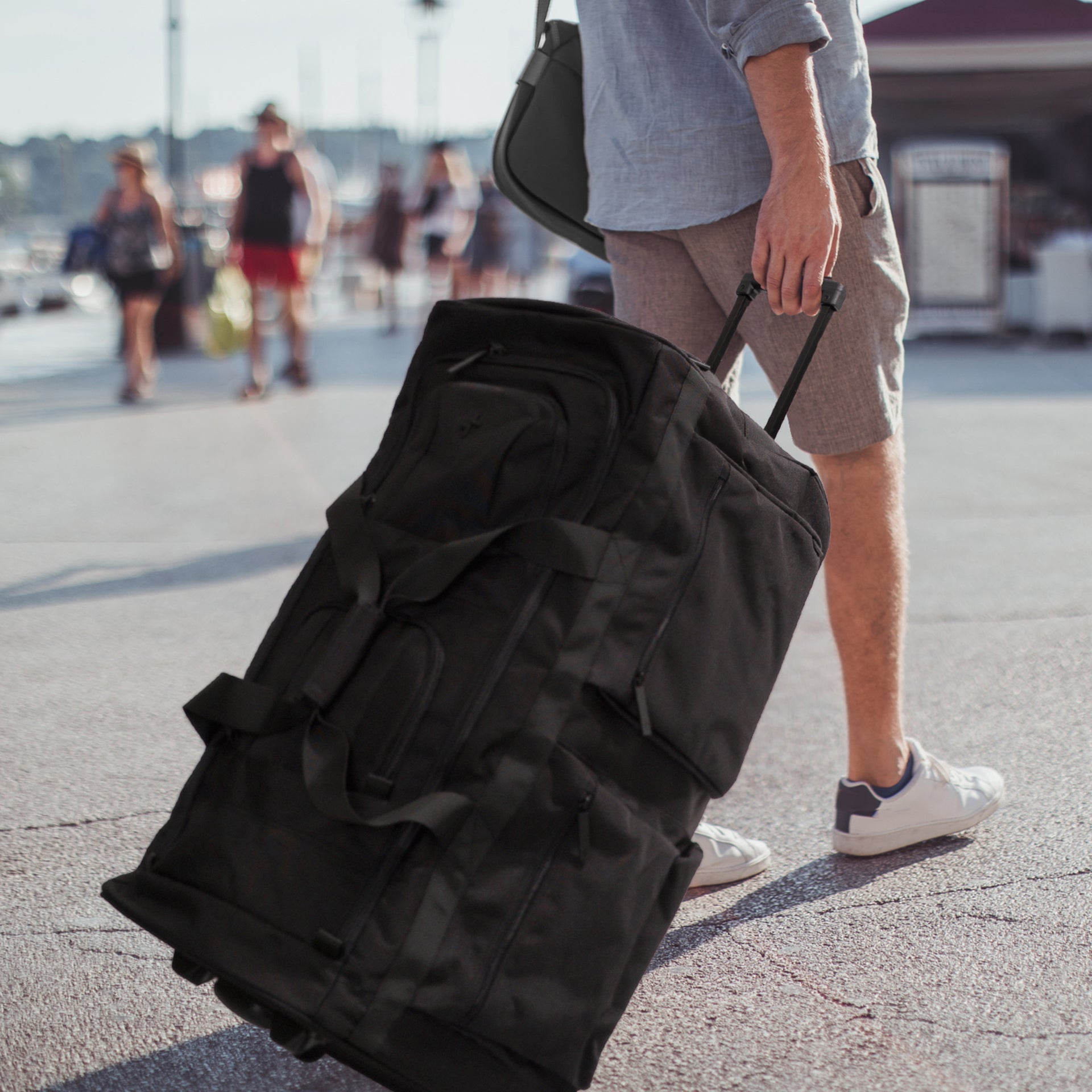 Best Rolling Duffle Bag for Travel & Gym - Water-Resistant Large Capacity Luggage with Wheels & Extendable Handle | Perfect for Business Trips, Weekend Getaways & Sports Equipment Storage