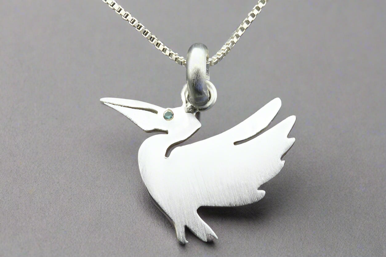 Sterling Silver Pelican Necklace with Blue Cubic Zirconia - Elegant Jewelry for Beach Vacations & Coastal Fashion