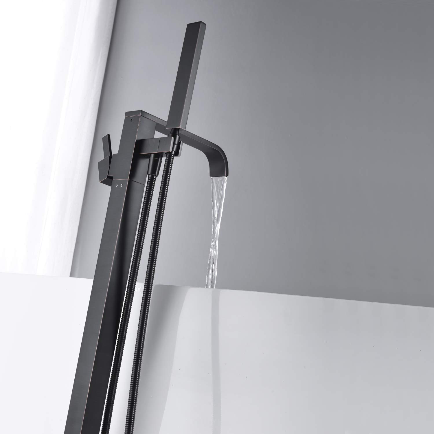 Freestanding Bathtub Faucet - Oil Rubbed Bronze Floor Mount Brass Tub Filler with Hand Shower - Single Handle Bathroom Faucet for Spa-Like Relaxation & Modern Bathroom Upgrade