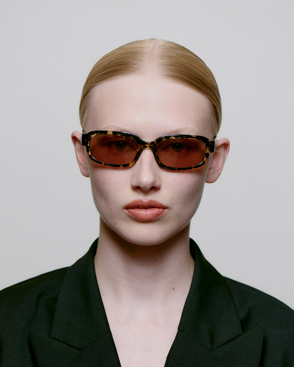 A. Kjaerbede Black/Yellow Tortoise Sunglasses - Stylish UV Protection for Outdoor Activities & Fashion