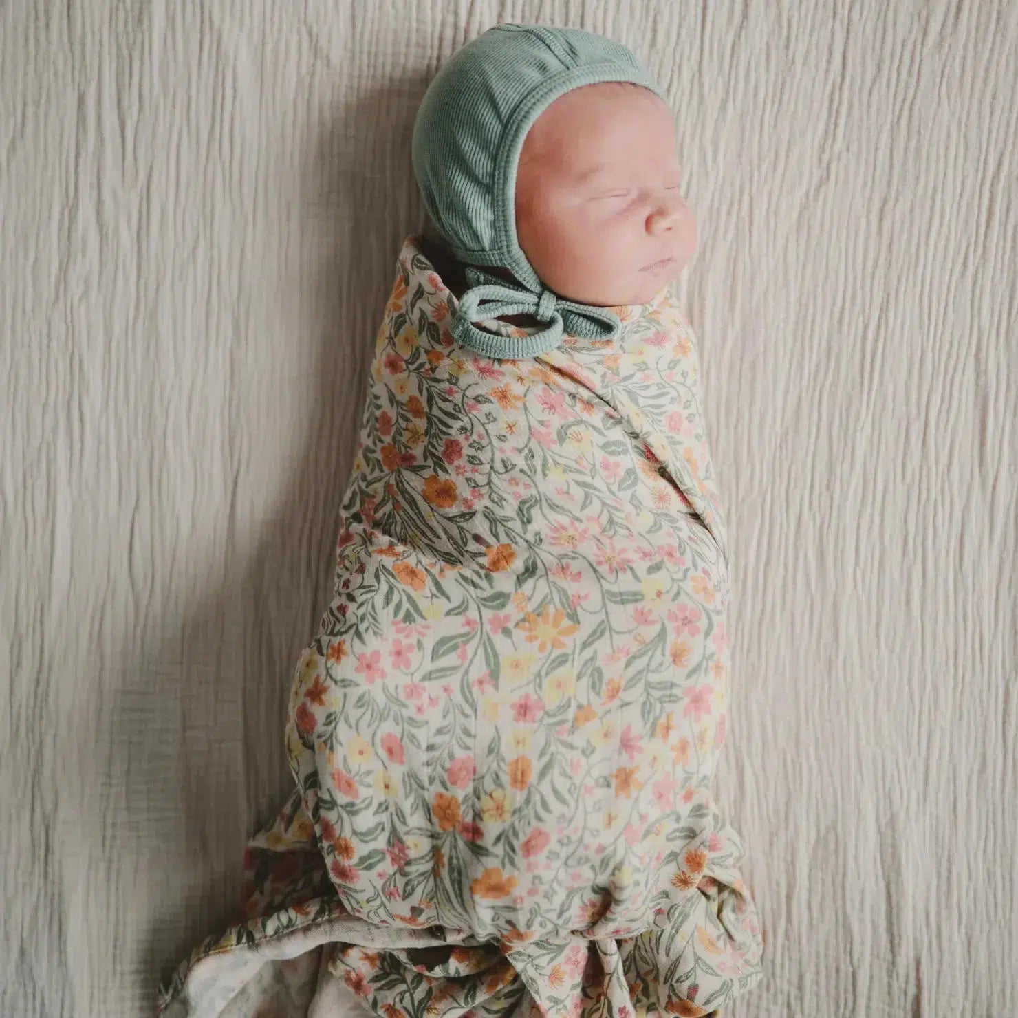 Mushie Organic Cotton Muslin Swaddle Blanket - Soft Baby Swaddle Wrap for Newborns & Infants, Breathable & Lightweight, Pastel Blooms Design - Perfect for Nursery, Swaddling, Stroller & Photo Shoots