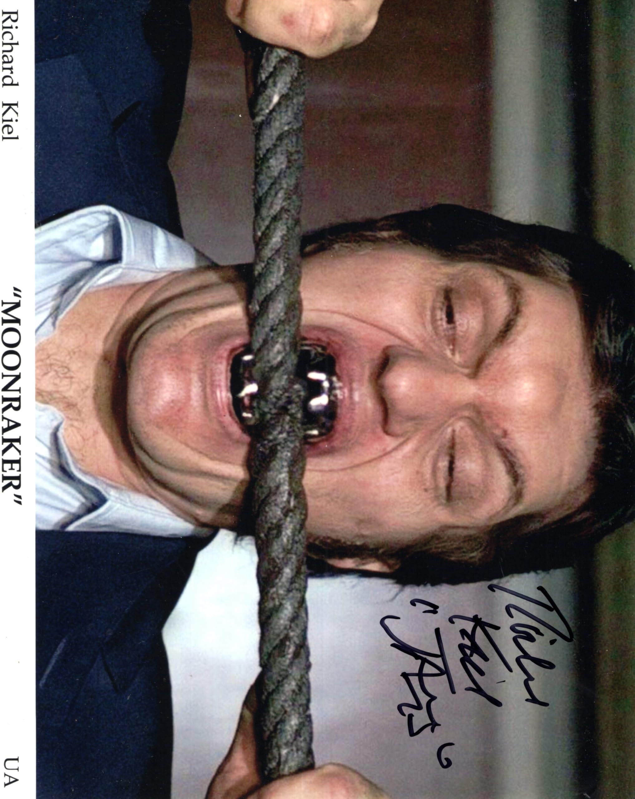 Richard Kiel Hand Signed 8x10 Color Photo with COA - Jaws from 007 James Bond Biting Wire Scene - Perfect for Movie Memorabilia Collectors & James Bond Fans