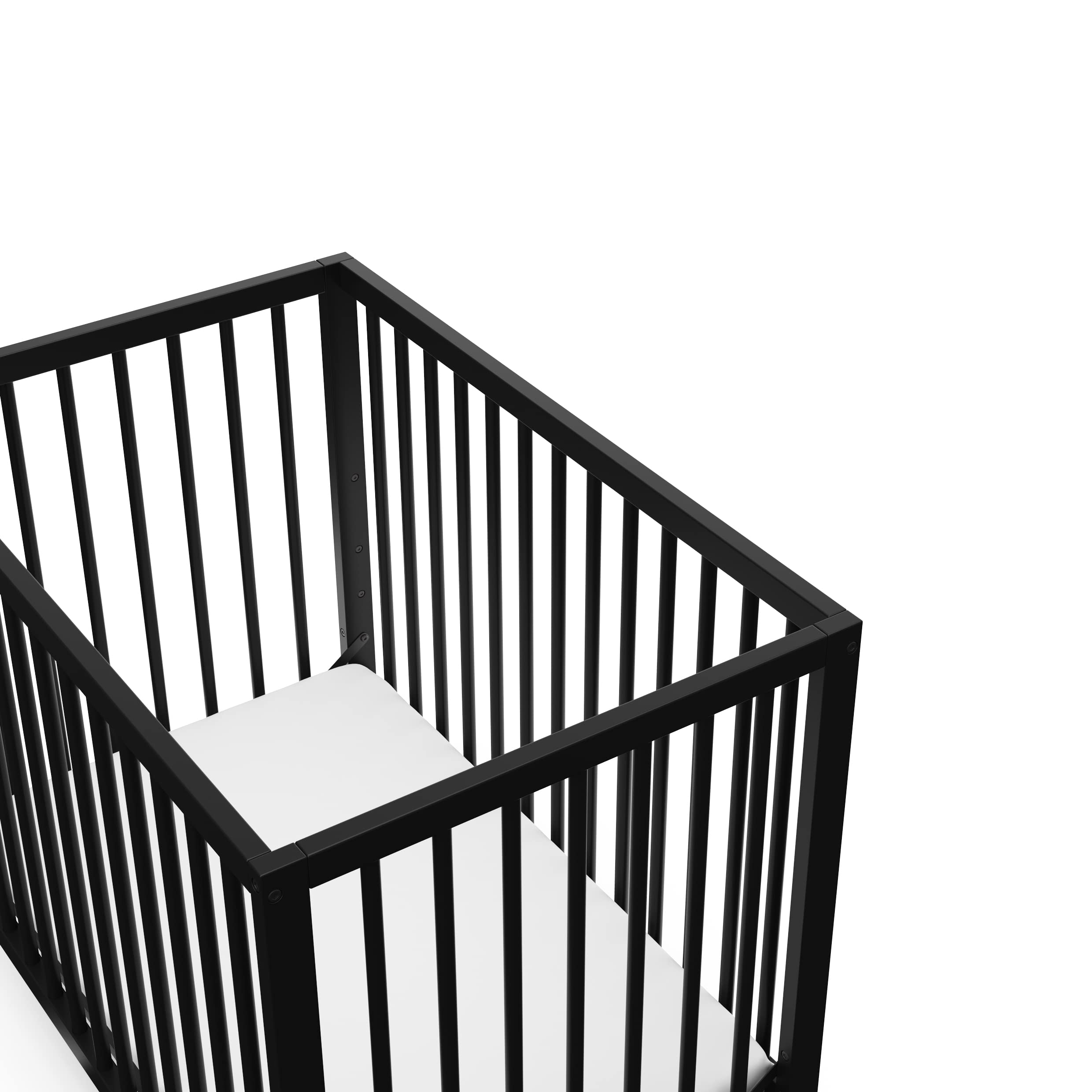 Graco Teddi 4-in-1 Convertible Mini Crib with Waterproof Mattress - GREENGUARD Gold Certified, Compact Nursery Bed for Small Spaces, Easy 30-Min Assembly (Black) | Perfect for Apartments, Daycares & Travel | Includes 2.75-Inch Mattress