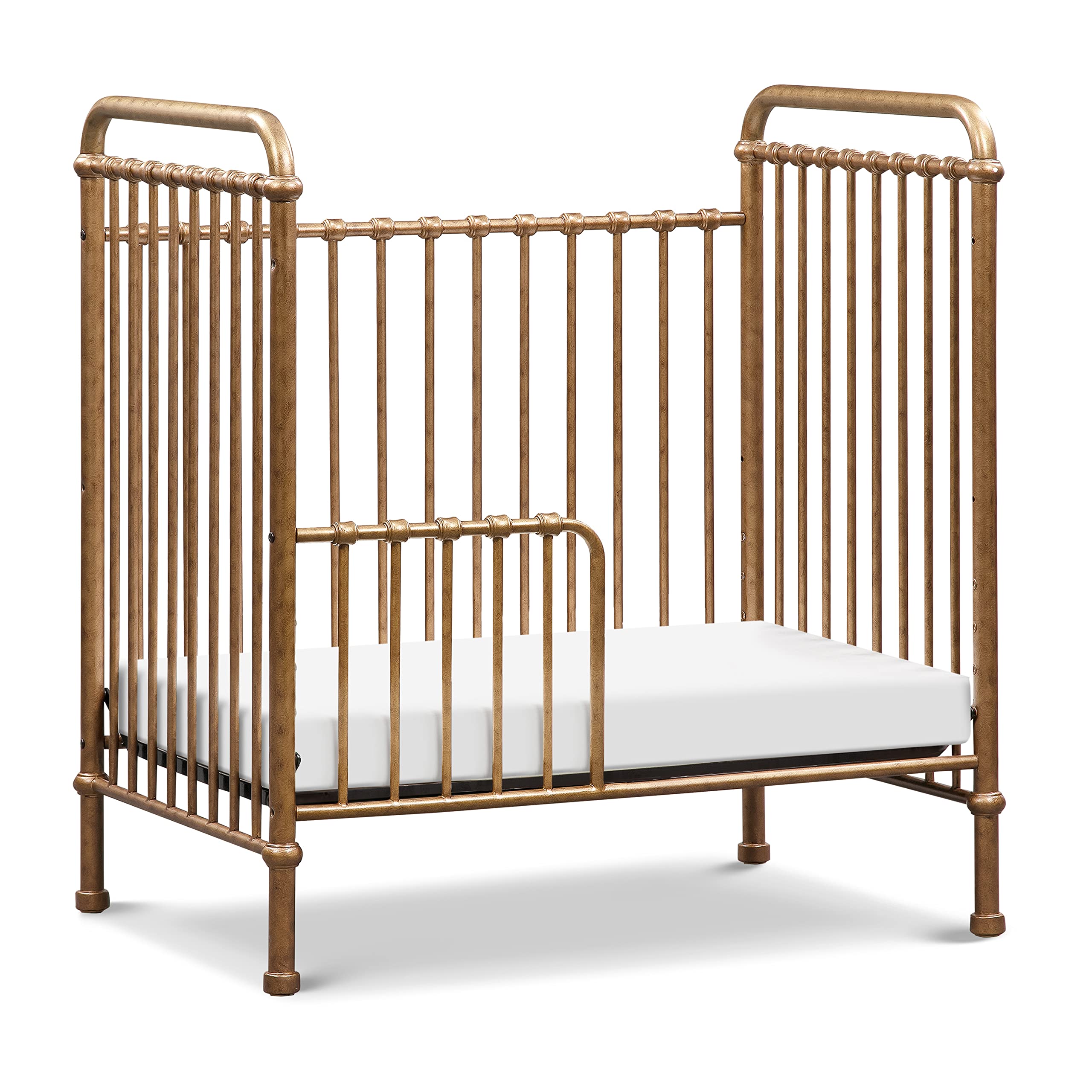 NAMESAKE Abigail 3-in-1 Convertible Mini Metal Crib in Vintage Gold - Greenguard Gold Certified Safe Nursery Furniture for Small Spaces | Perfect for Apartments, Nursery Rooms & Guest Bedrooms