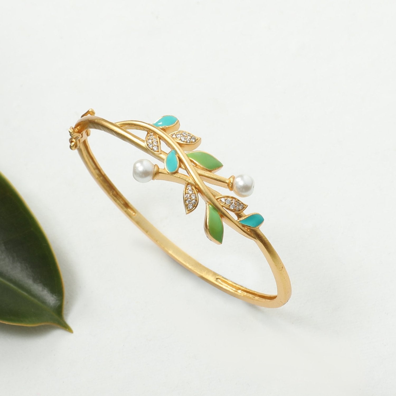 Eriha Pearl Nakshtra CZ Green Leaf Bracelet - Elegant Cubic Zirconia Leaf Design Jewelry for Women | Perfect for Weddings, Parties & Special Occasions