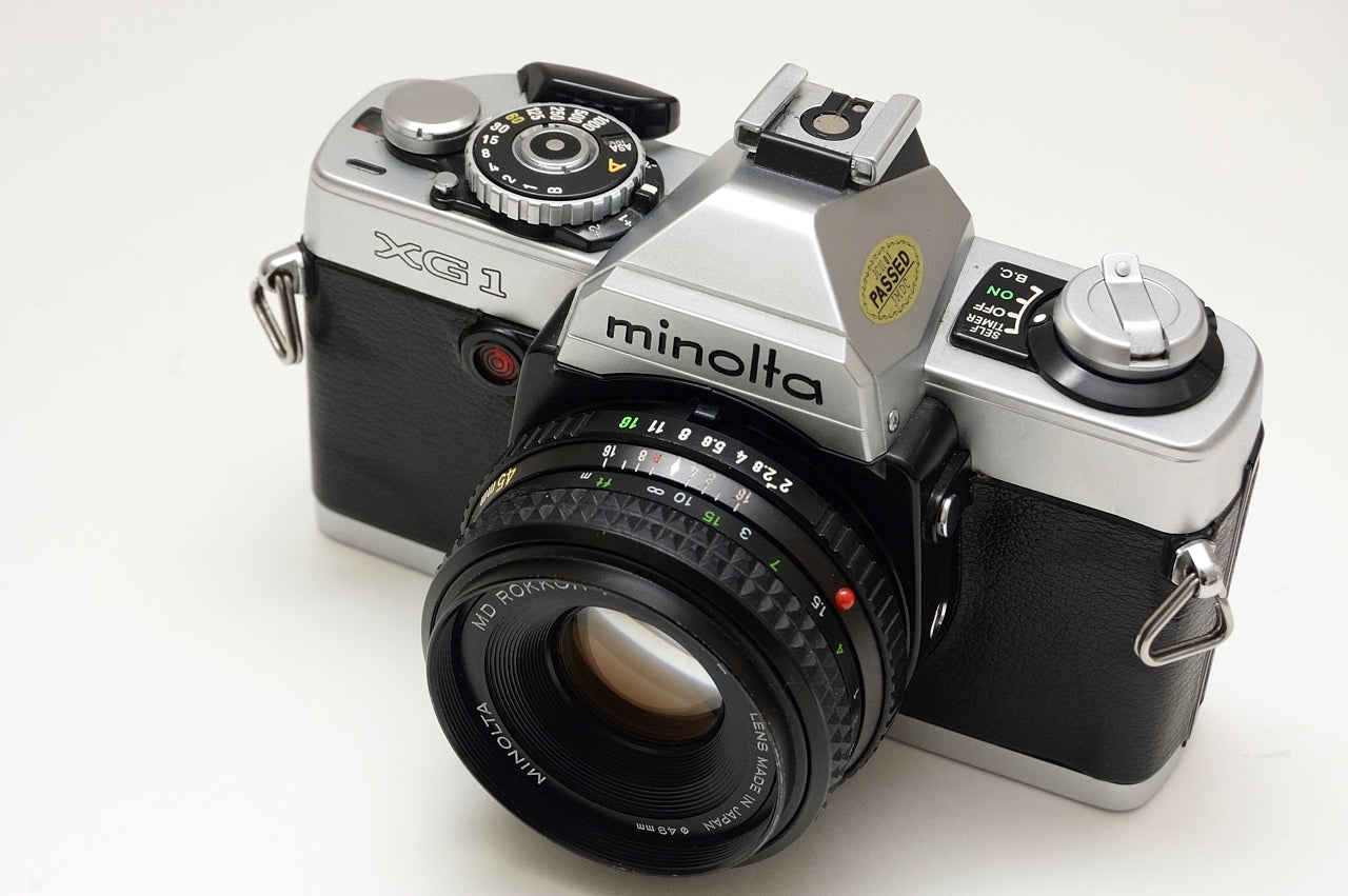Vintage Minolta XG1 35mm Film SLR Camera with 45mm f/2 Lens - Classic Photography, Film Enthusiasts, Retro Shooting Experience