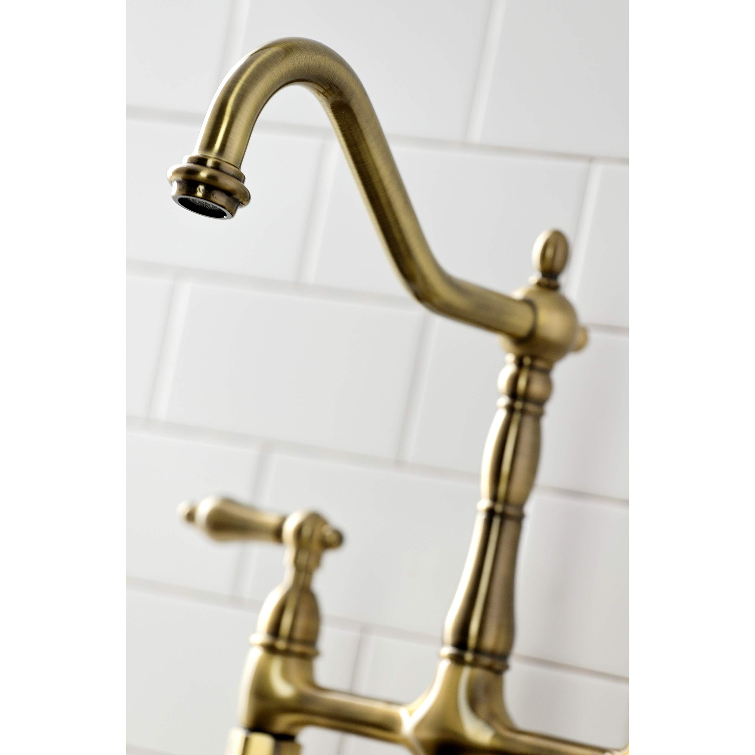 Kingston Brass KS1273ALBS Heritage 8-Inch Kitchen Bridge Faucet with Brass Sprayer - Antique Brass Finish - Perfect for Farmhouse, Vintage & Traditional Kitchen Sinks
