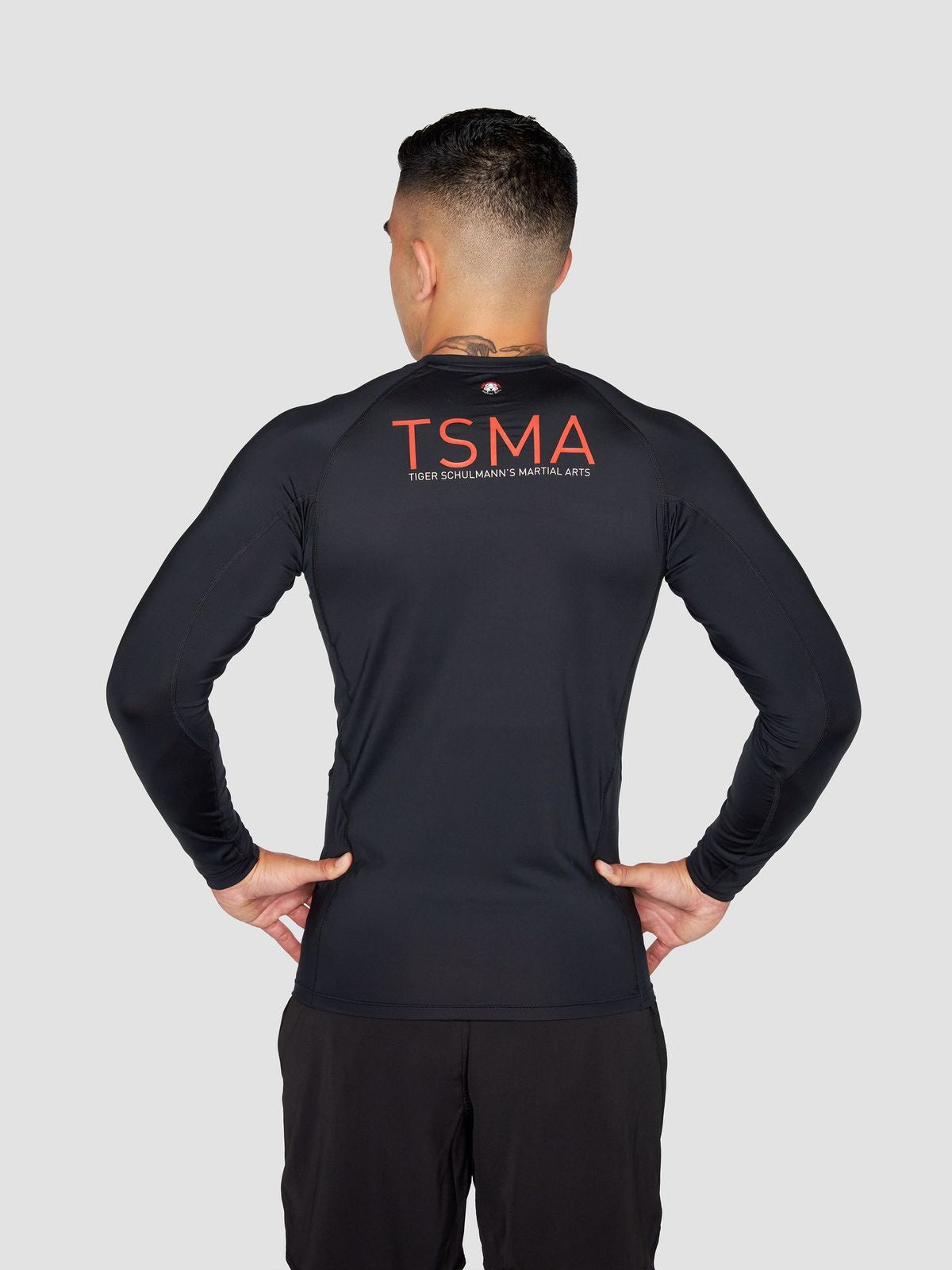 Rebel Rashguard for Men & Women - UPF 50+ Sun Protection Black Swim Shirt for Surfing, Swimming & Water Sports