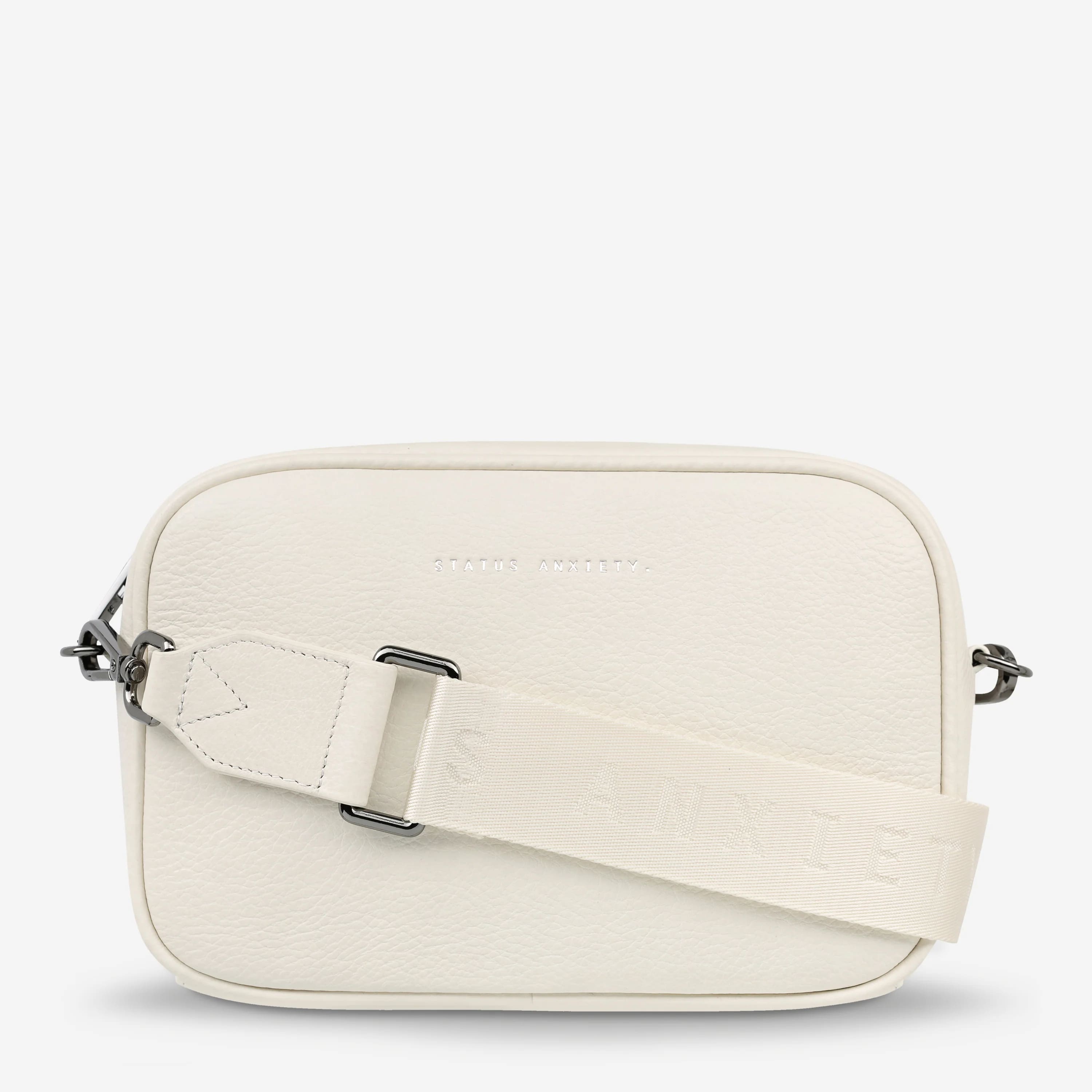 Status Anxiety Plunder Crossbody Bag with Webbed Strap in Chalk - Perfect for Everyday Use, Work, and Travel