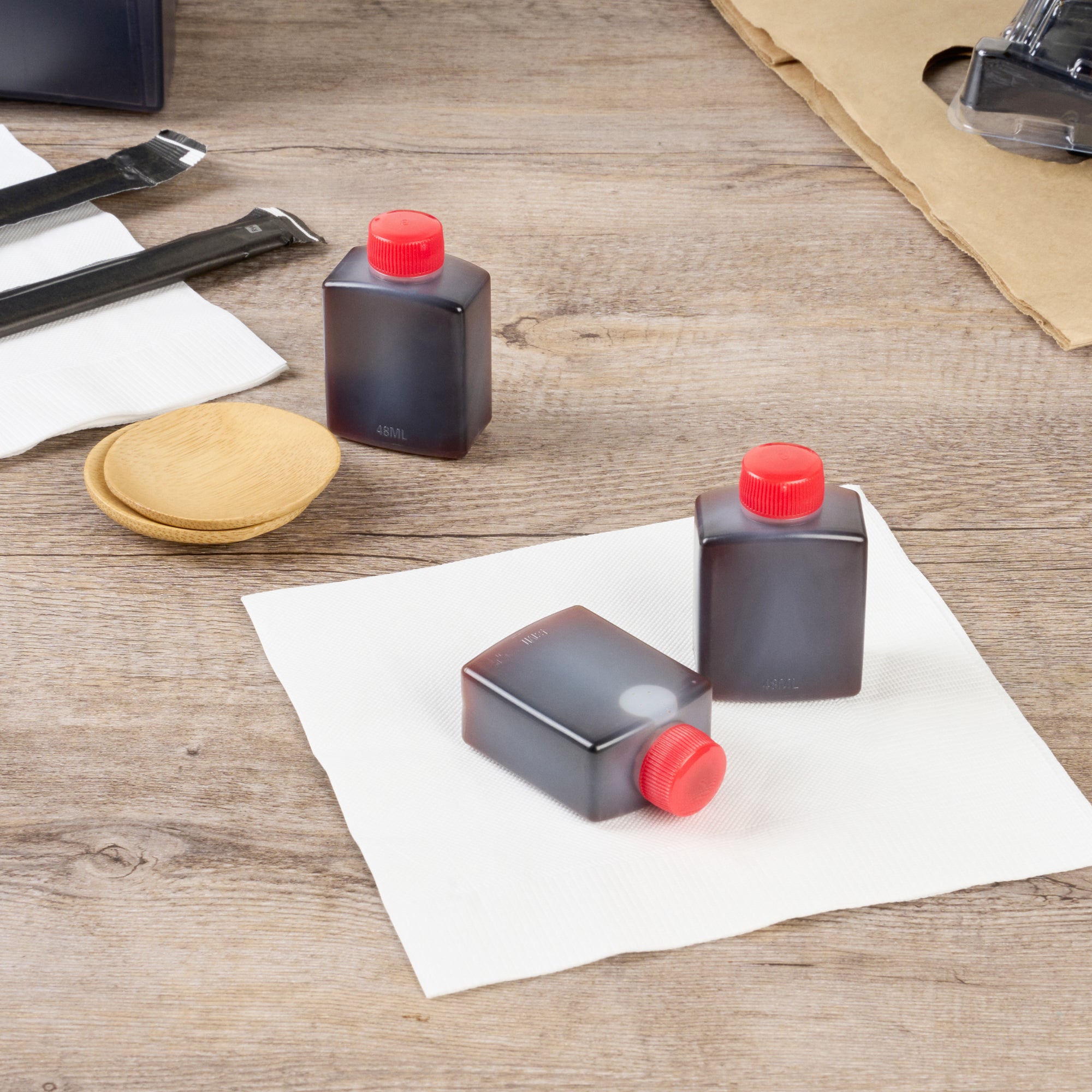 Bento Tek 2 oz Clear Plastic Soy Sauce Bottles with Red Caps (1.5